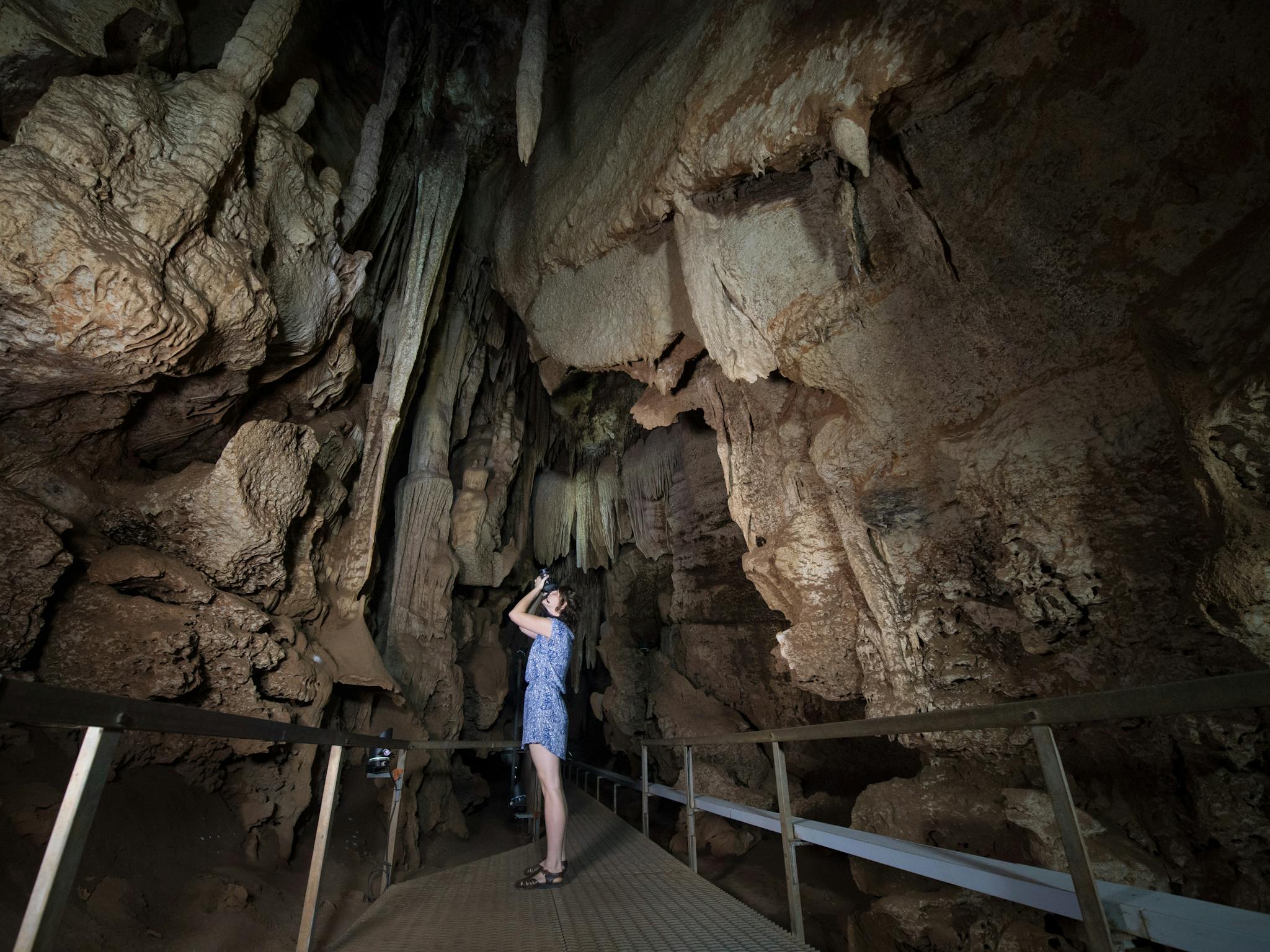 A group exploring the Cutta Cutta Caves
