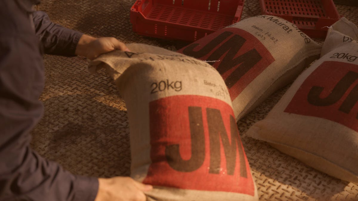 Hessian sacks of Australian-grown coffee prepared on the Jack Murat farm after processing.