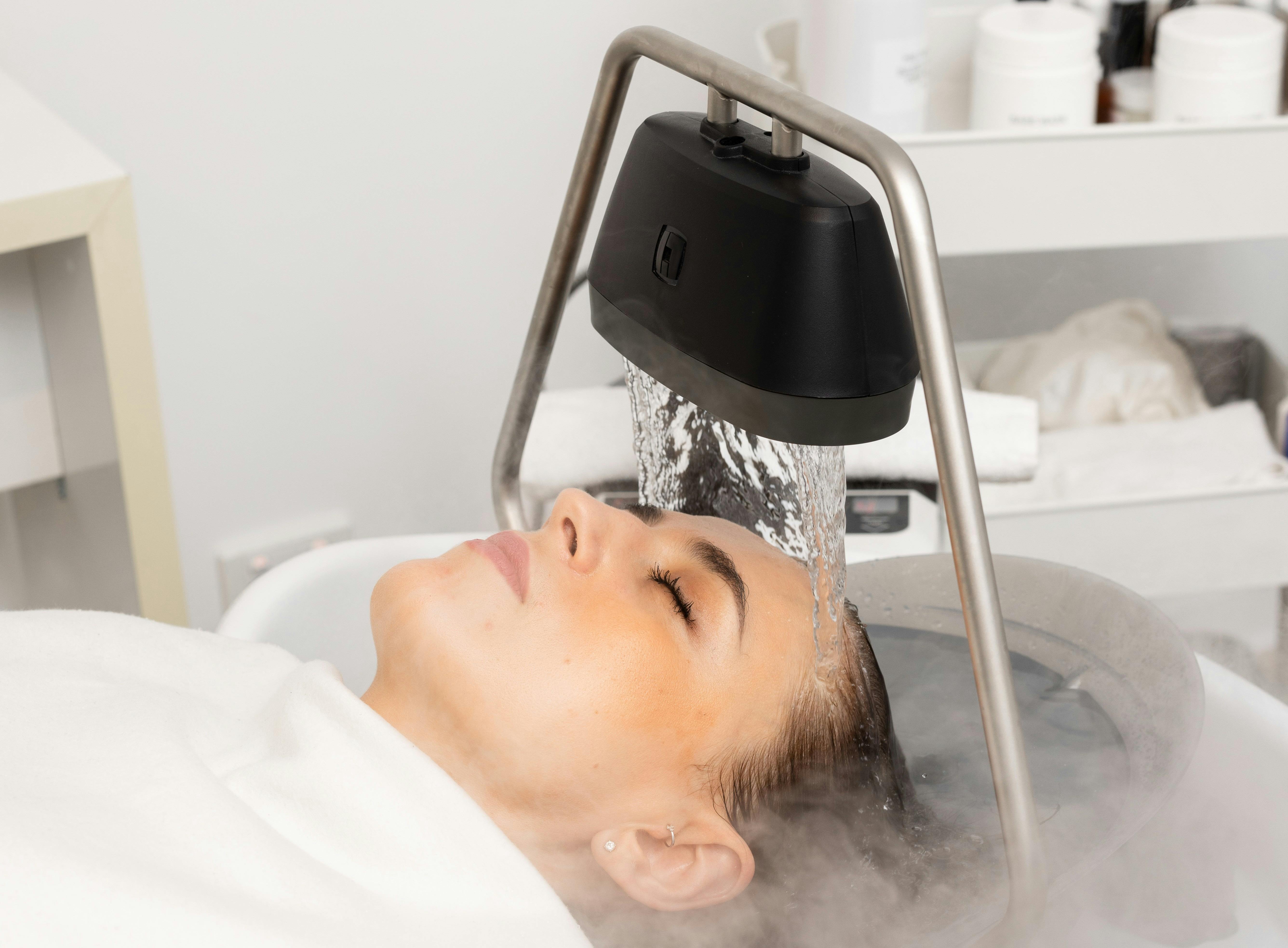 Japanese head spa waterfall rinse treatment in Melbourne. Luxury head spa ritual in South Yarra.