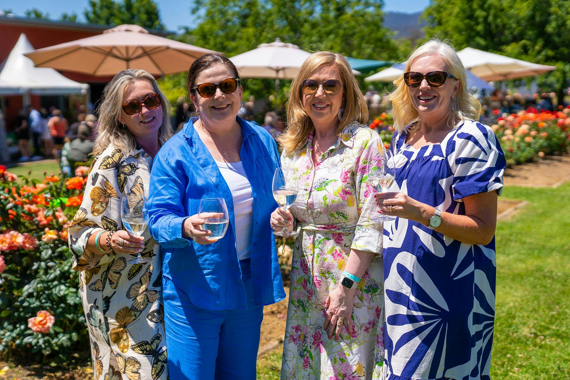 group of ladies enjoing Prosecco and La Dolce Vita Festival at Pizzini