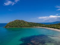 Aerial image of Cape Tribulation: beach, rainforest and reef meet.