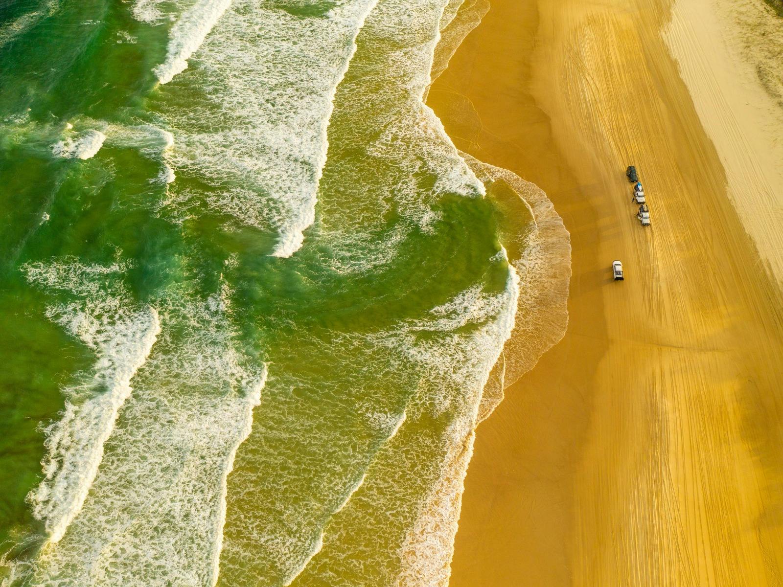 Enjoy a tag along tour on K'gari