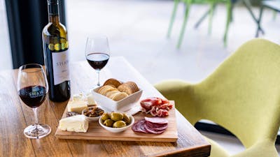 grazing platter and red wine on a table from Shaw Estate Wines Canberra