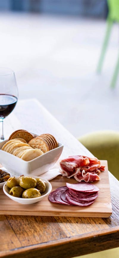 grazing platter and red wine on a table from Shaw Estate Wines Canberra
