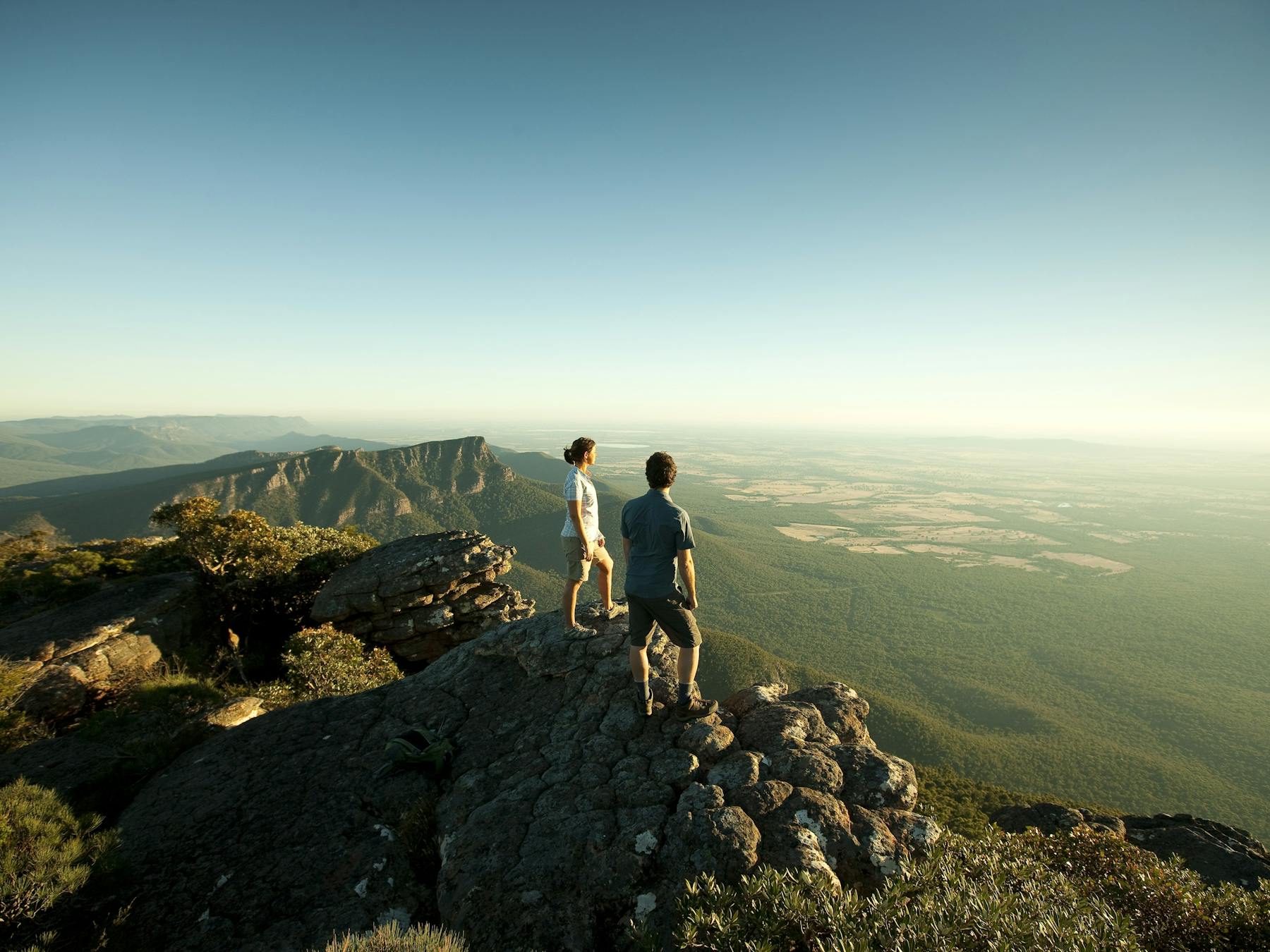 Two people looking out to the view of the Grampians