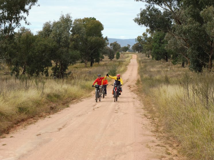 4 Cyclist on gravel road