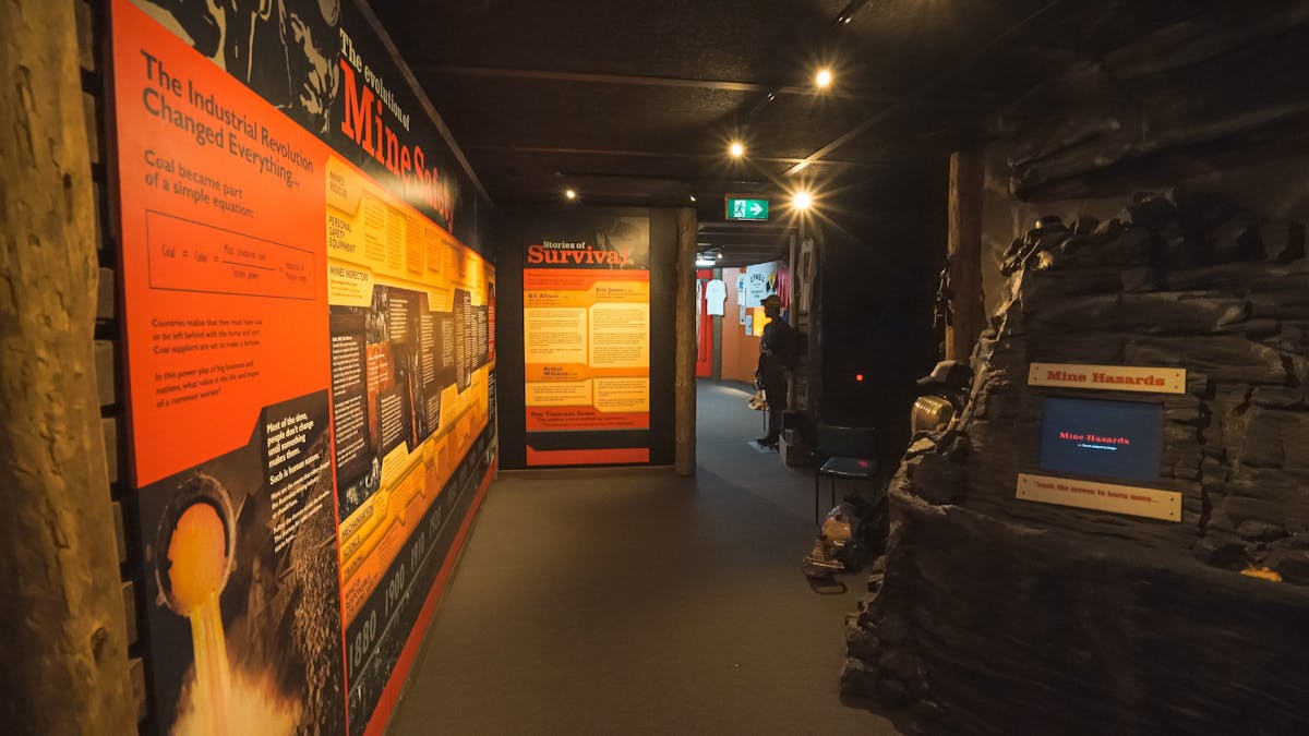 Information display in museum entry regarding mine safety and hazards