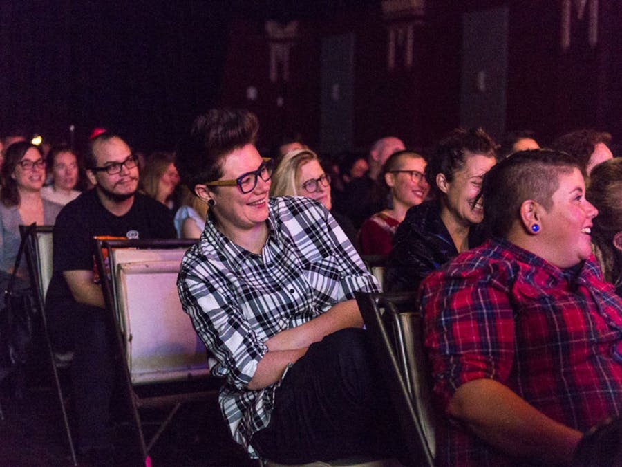 A photo of an audience enjoying Queerstories