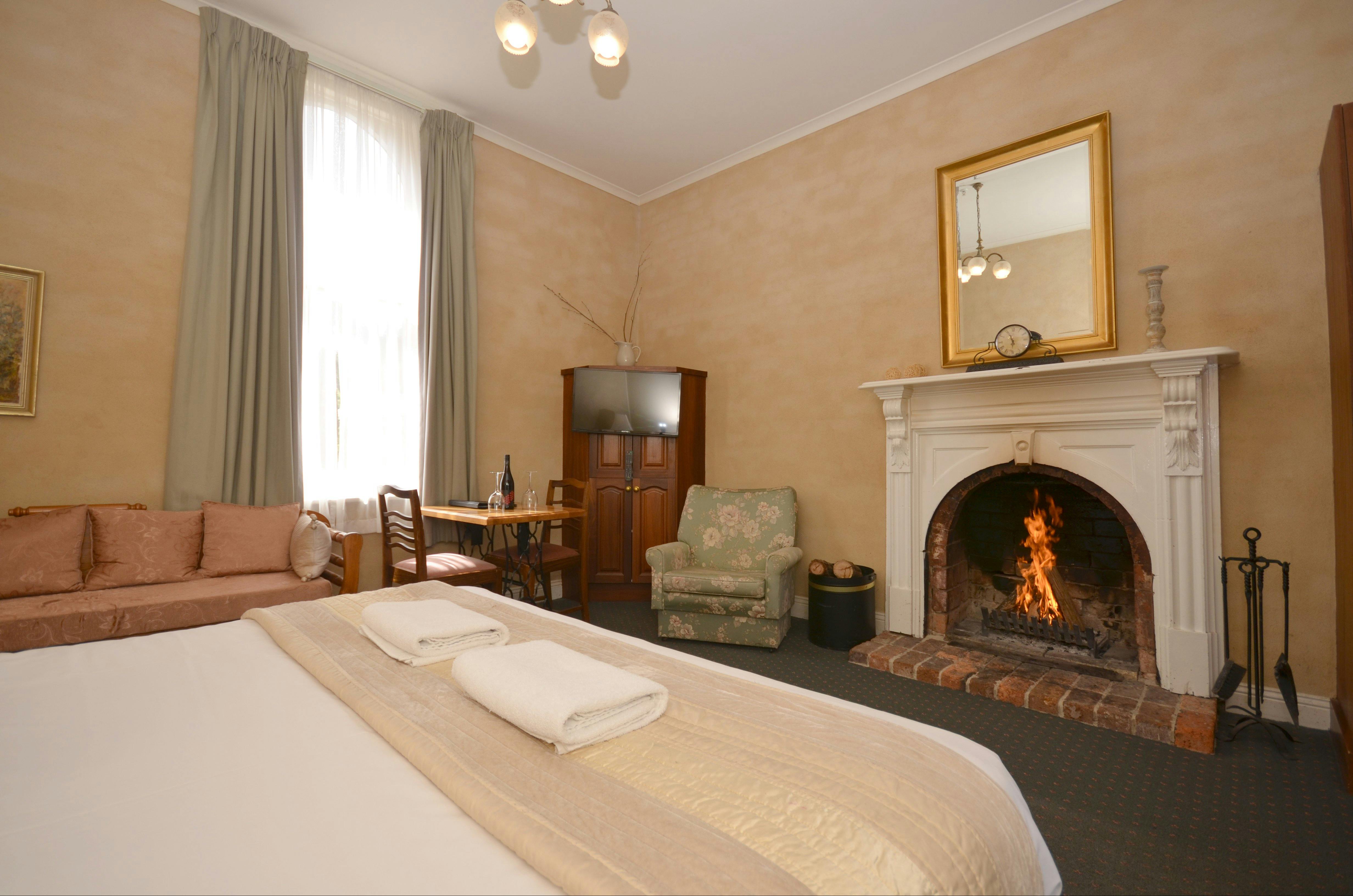 Heritage King Fire Place Room
