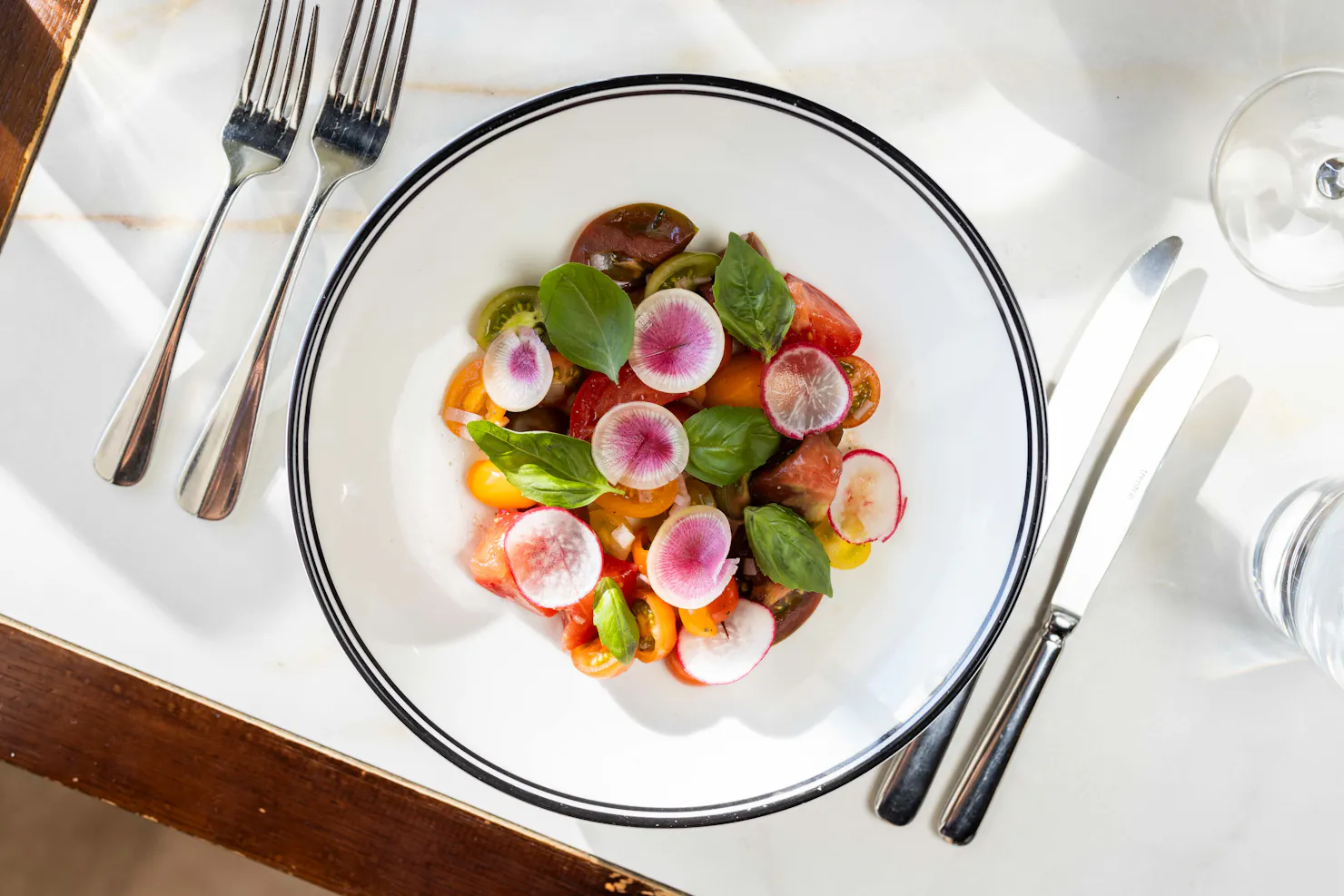 Tomato salad, radish, rocket, basil, shallots