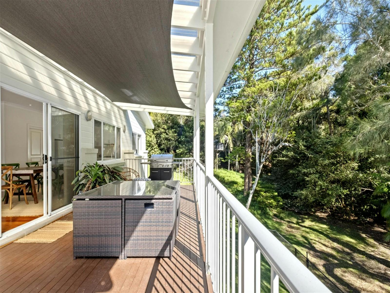 Upstairs outdoor balcony equipped with a gas BBQ, ideal for al fresco dining and entertaining