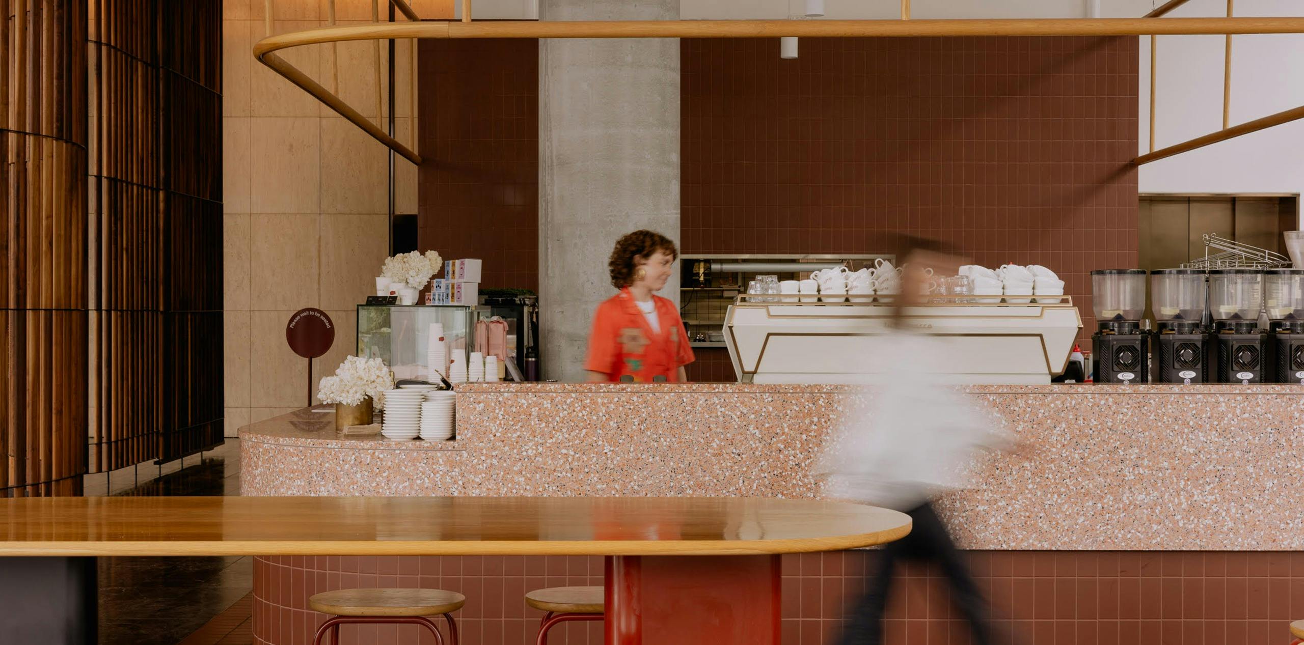 staff member at Redbrick Coffee City