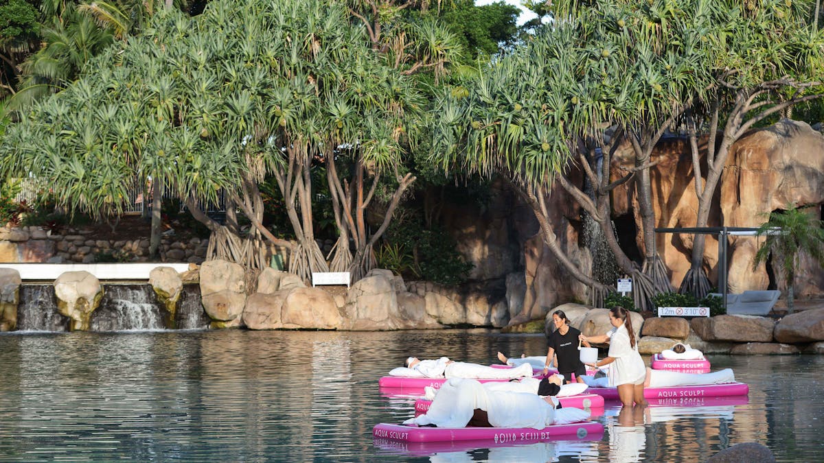 Participants floating during sound therapy in an award winning pool location in the Gold Coast