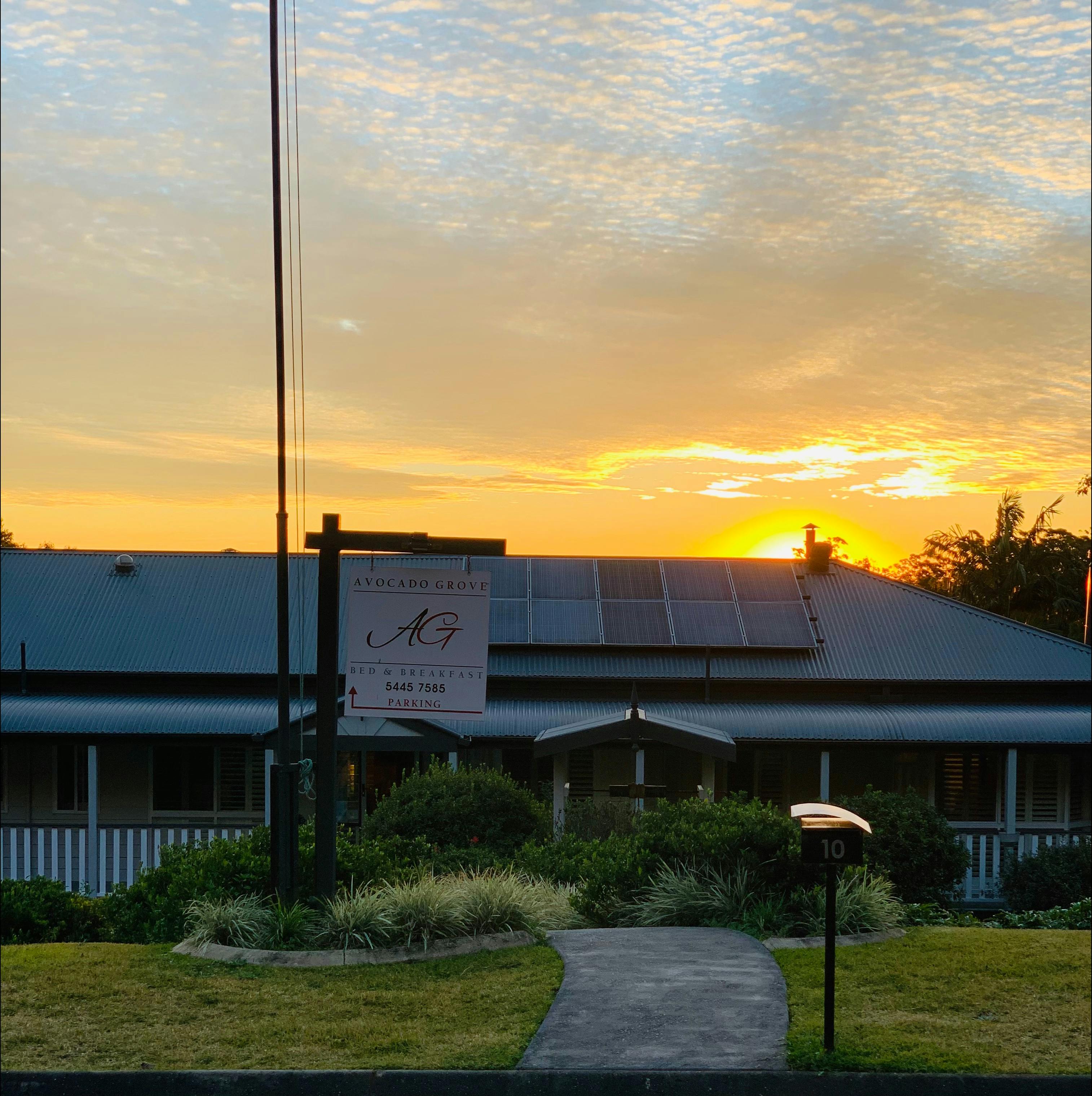 Street view of Avocado Grove BnB  showing sunset