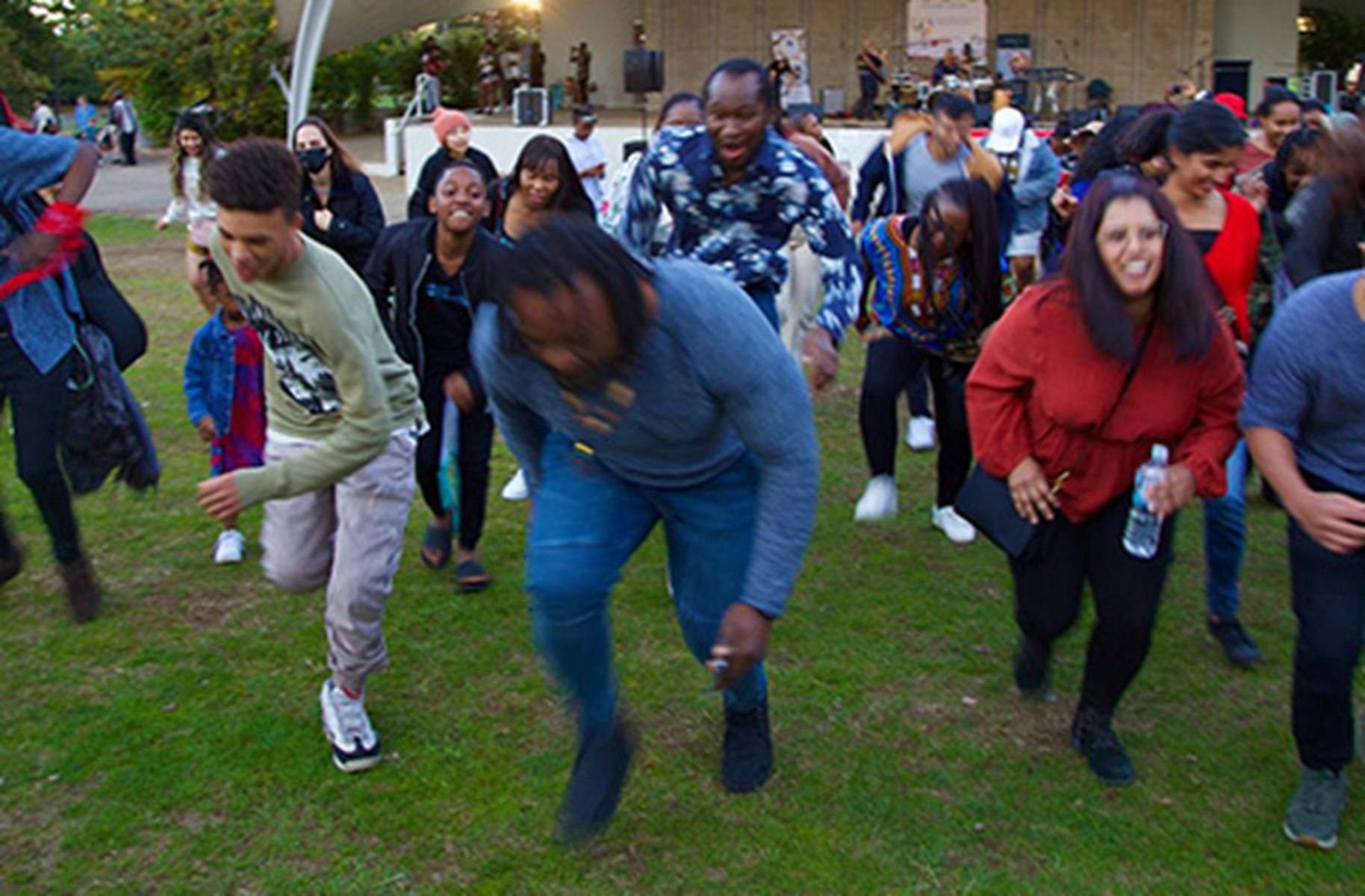Image of several people dancing in front of Stage 88