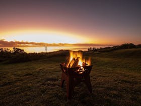 Nestle by the fire and listening to the waves