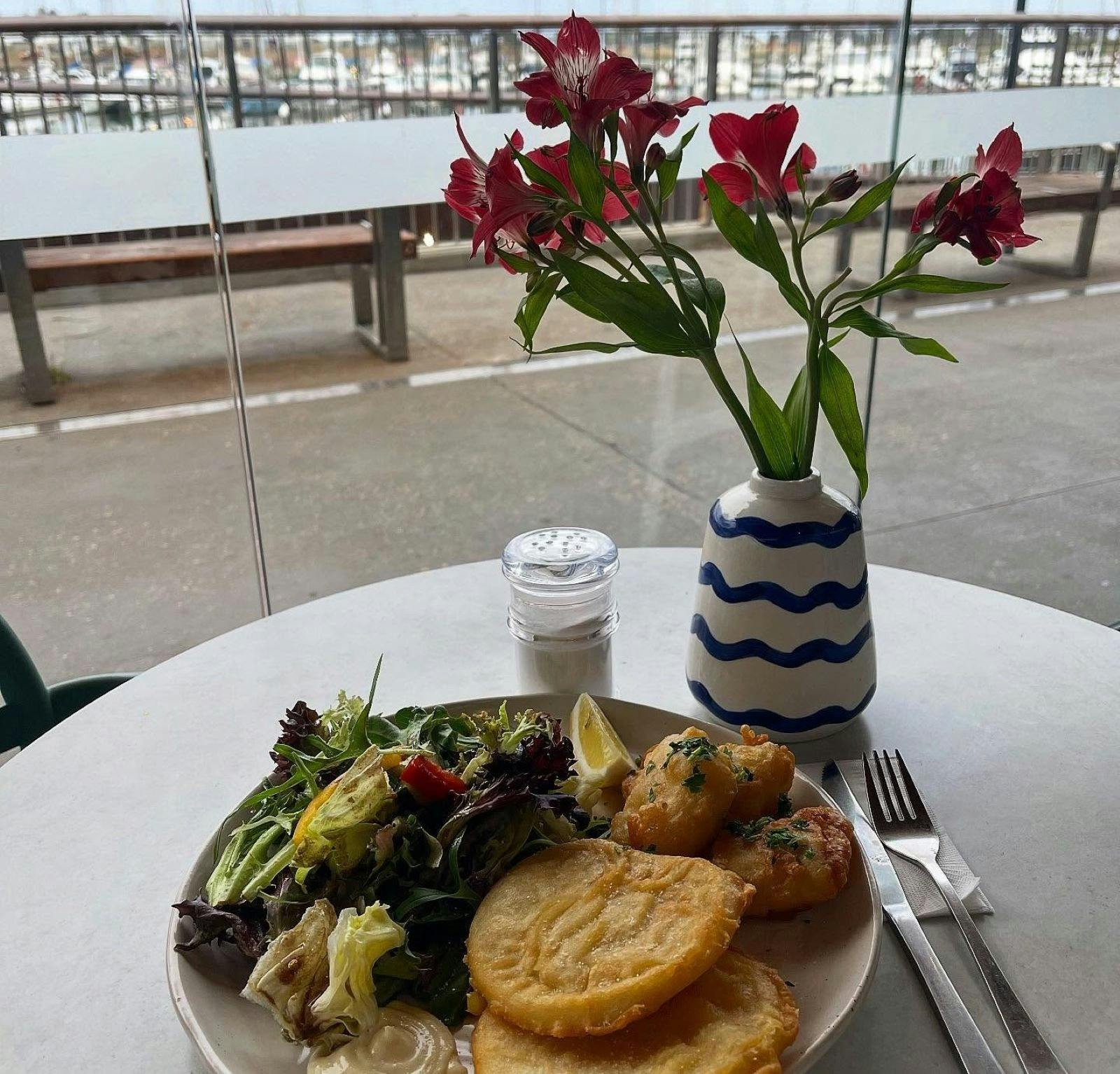 Blue Fin & Marina dining overlooking the sparkling waters at the Marina
