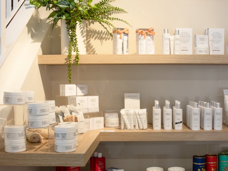 Skincare displayed on shelves.