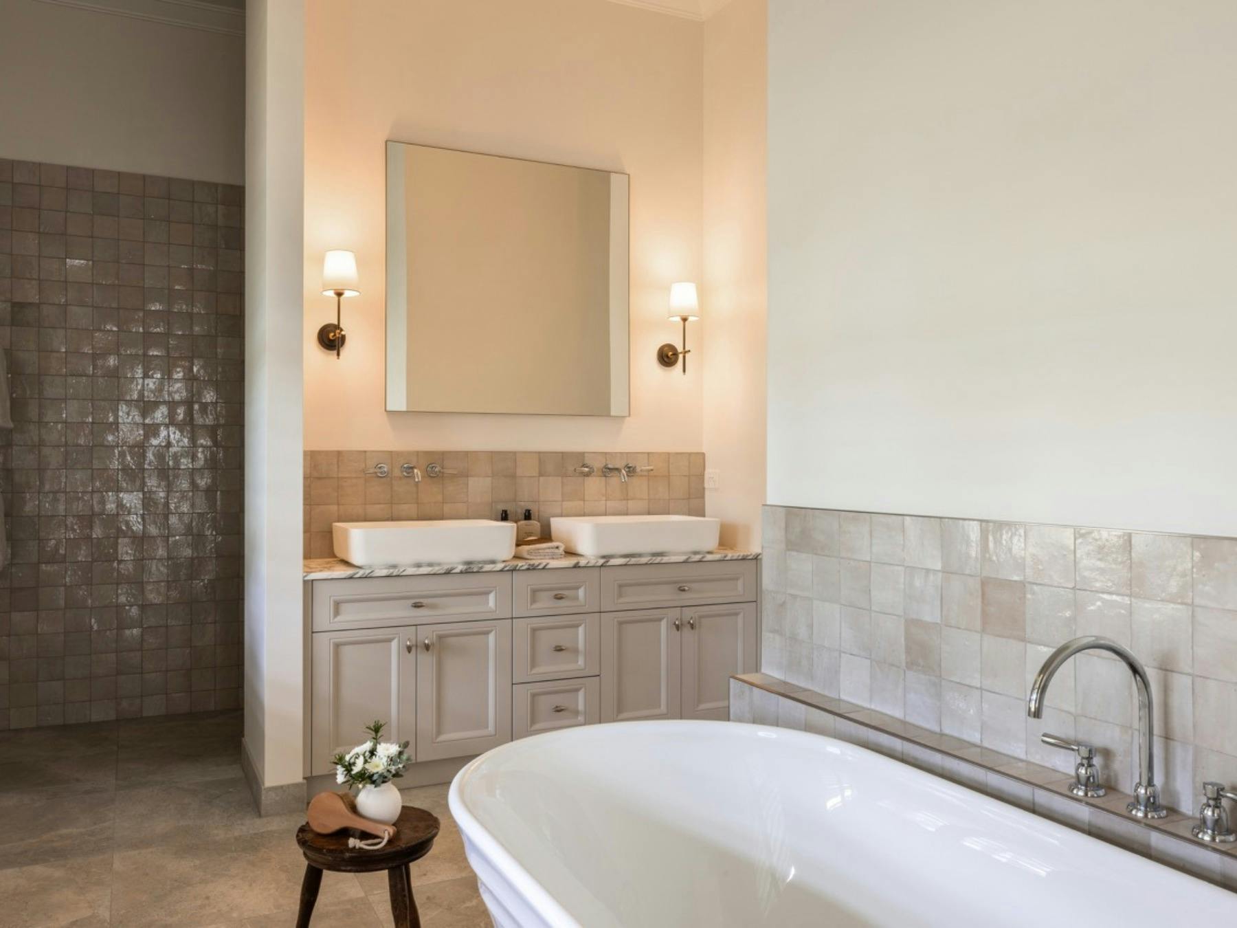 Luxury bathroom with freestanding bath and stone finishes at Stonehaven Estate