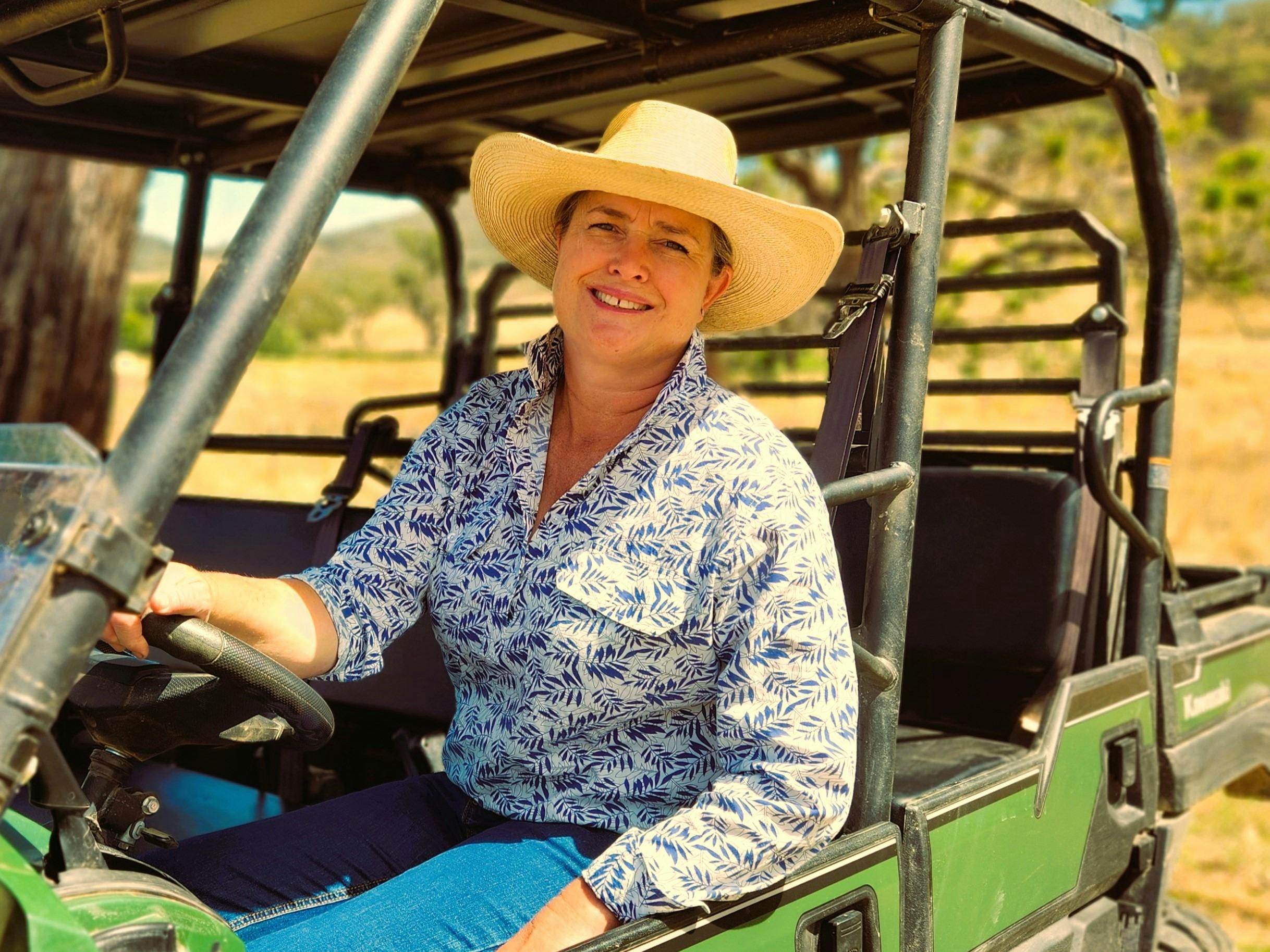Piambong Creek Farm Tour Guide and farm owner Beth Greenfield in open air buggy