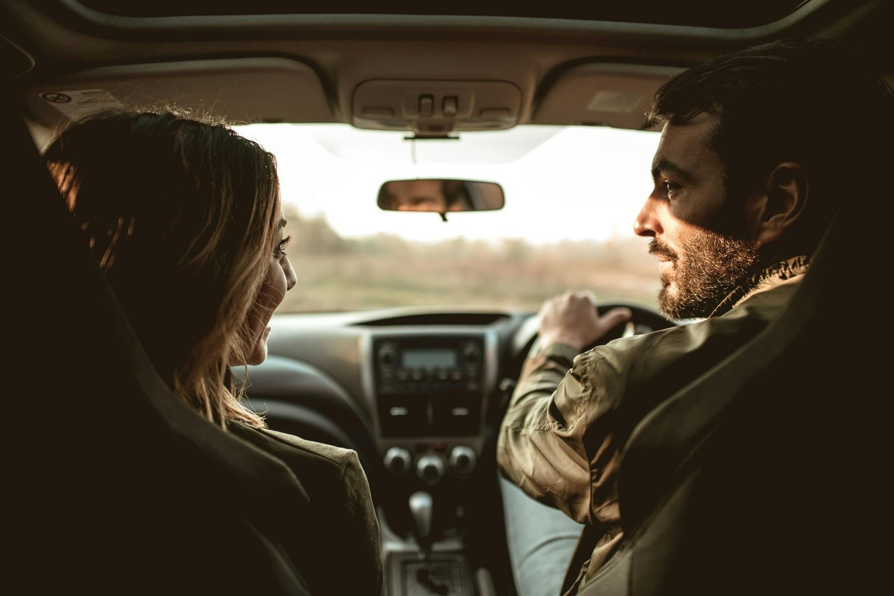 avis car rentals couple driving