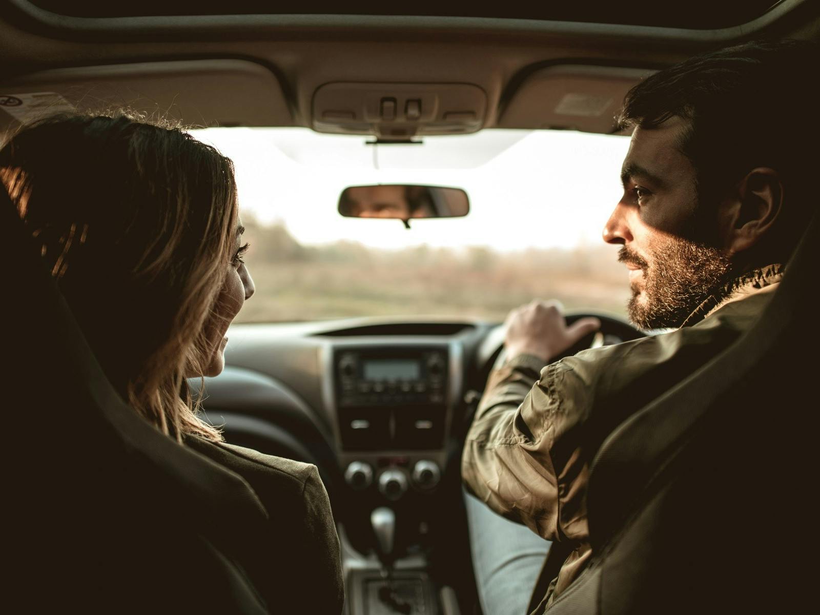 avis car rentals couple driving