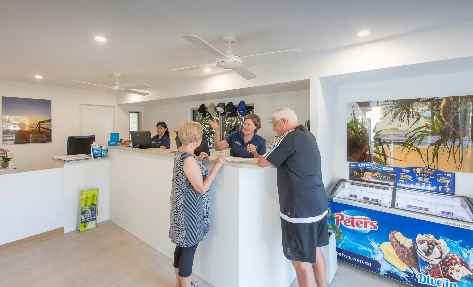 Image of Mudjimba Beach Holiday Park Office with staff and guests checking in