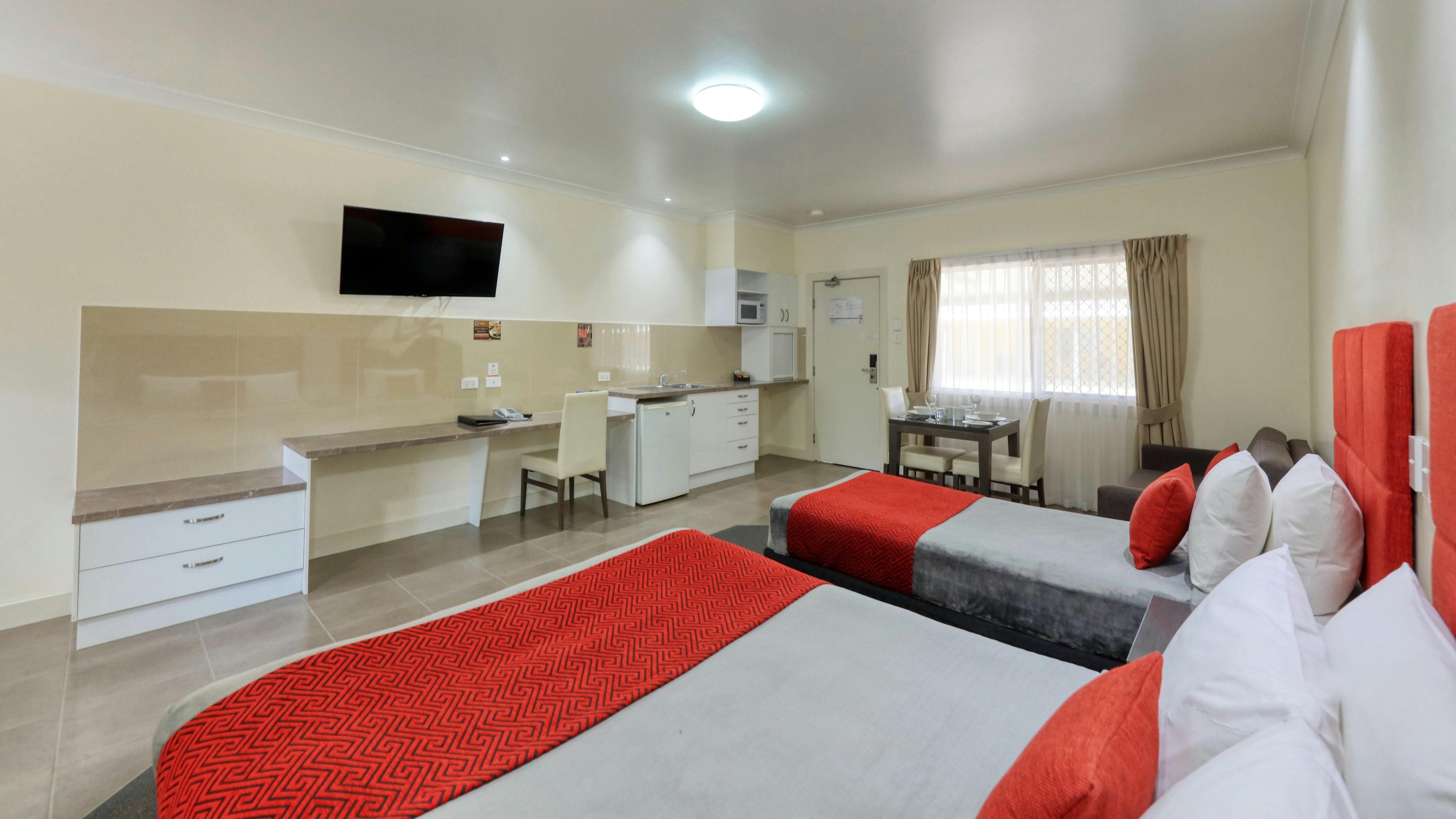 queen and single bed with our kitchenette showing very spacious
