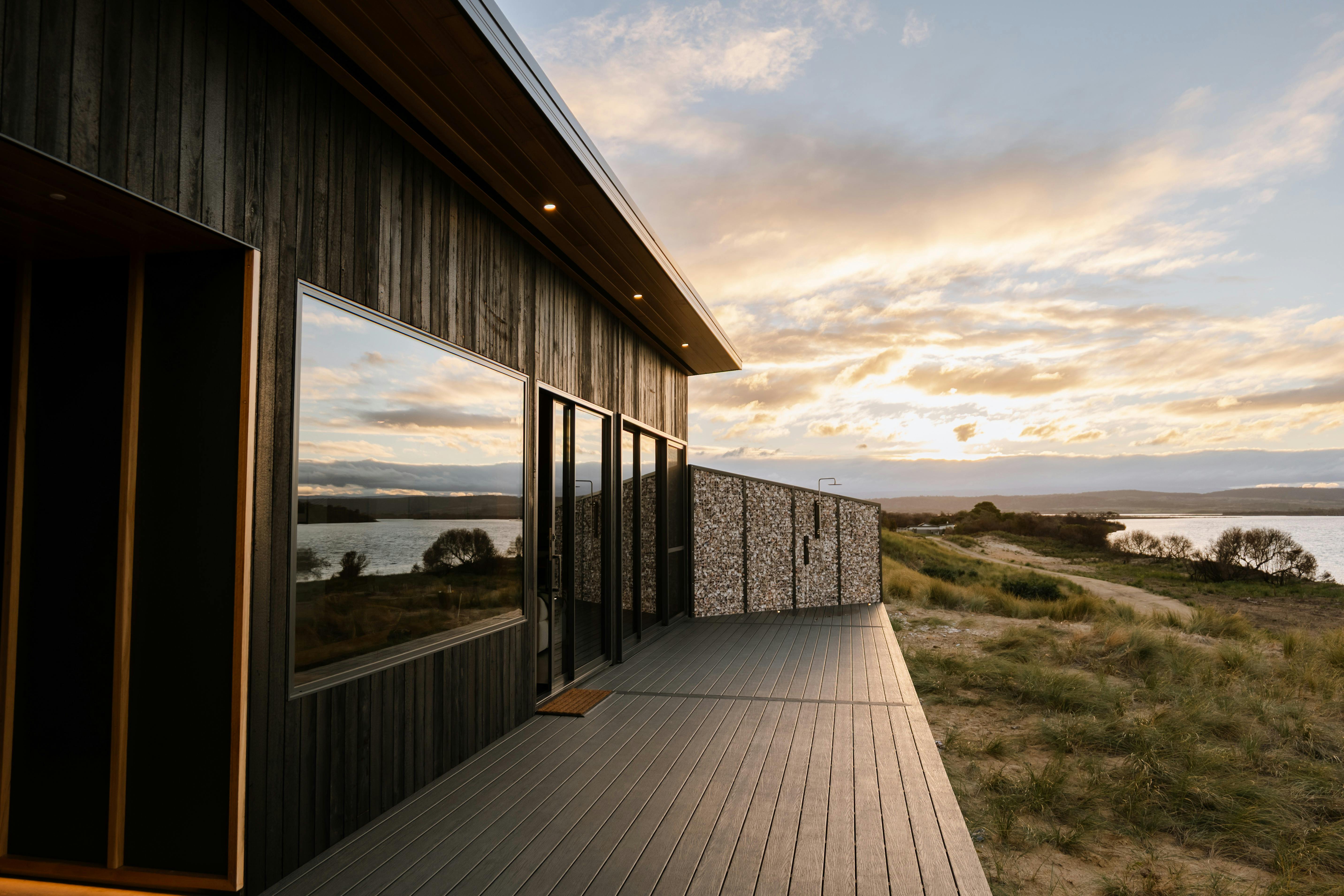 Swan River and a spacious deck wrap around the front of Sand Shacks