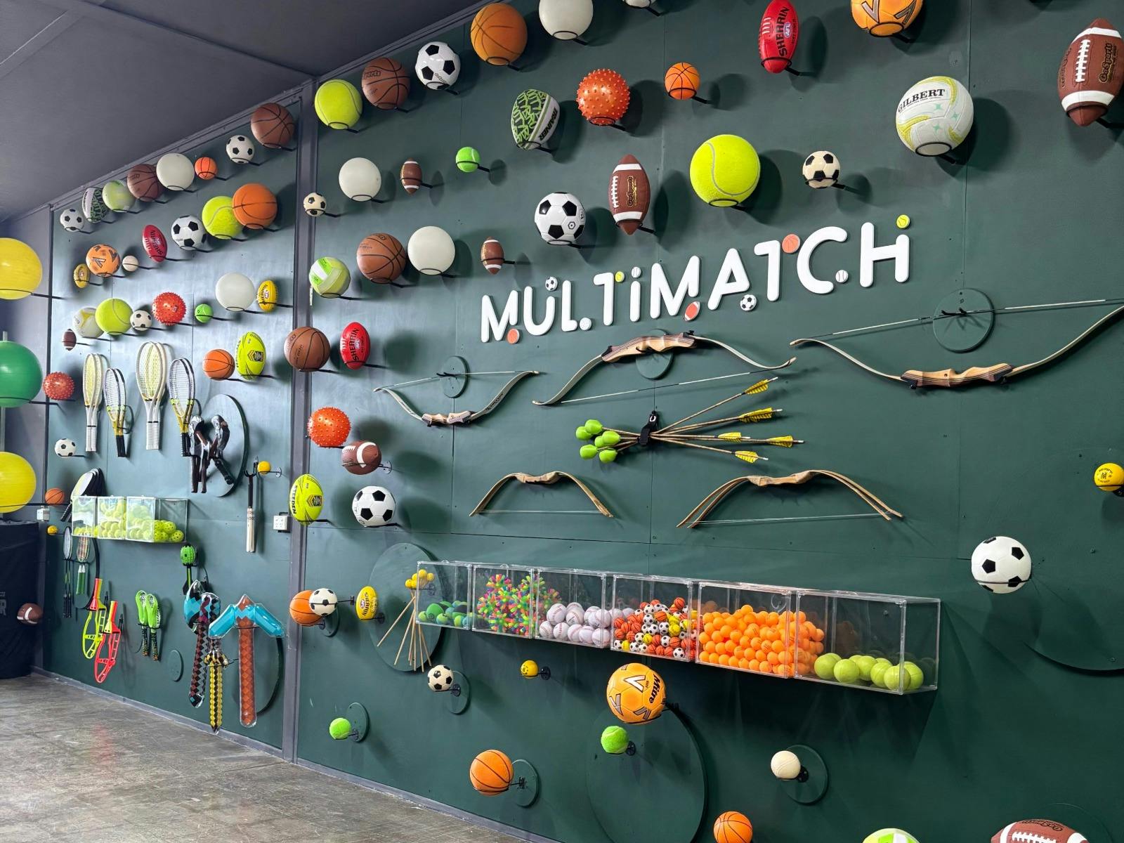 MultiMatch Cleveland equipment wall with sports balls and gear in the indoor studio. MultiMatch Cleveland equipment wall with sports balls and gear in the indoor studio.