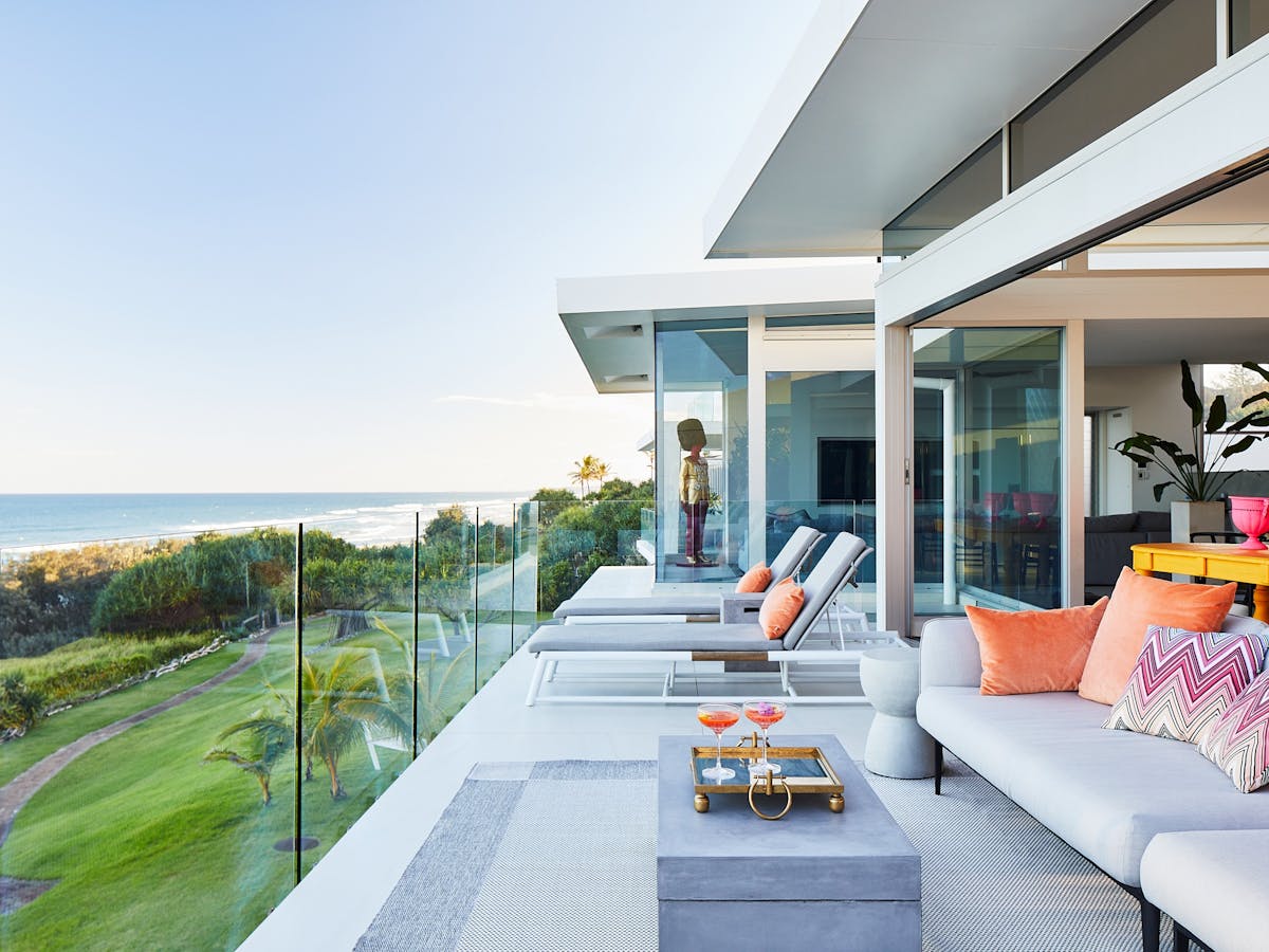Multiple undercover alfresco areas and a large grassed play area, private balconys, ocean views