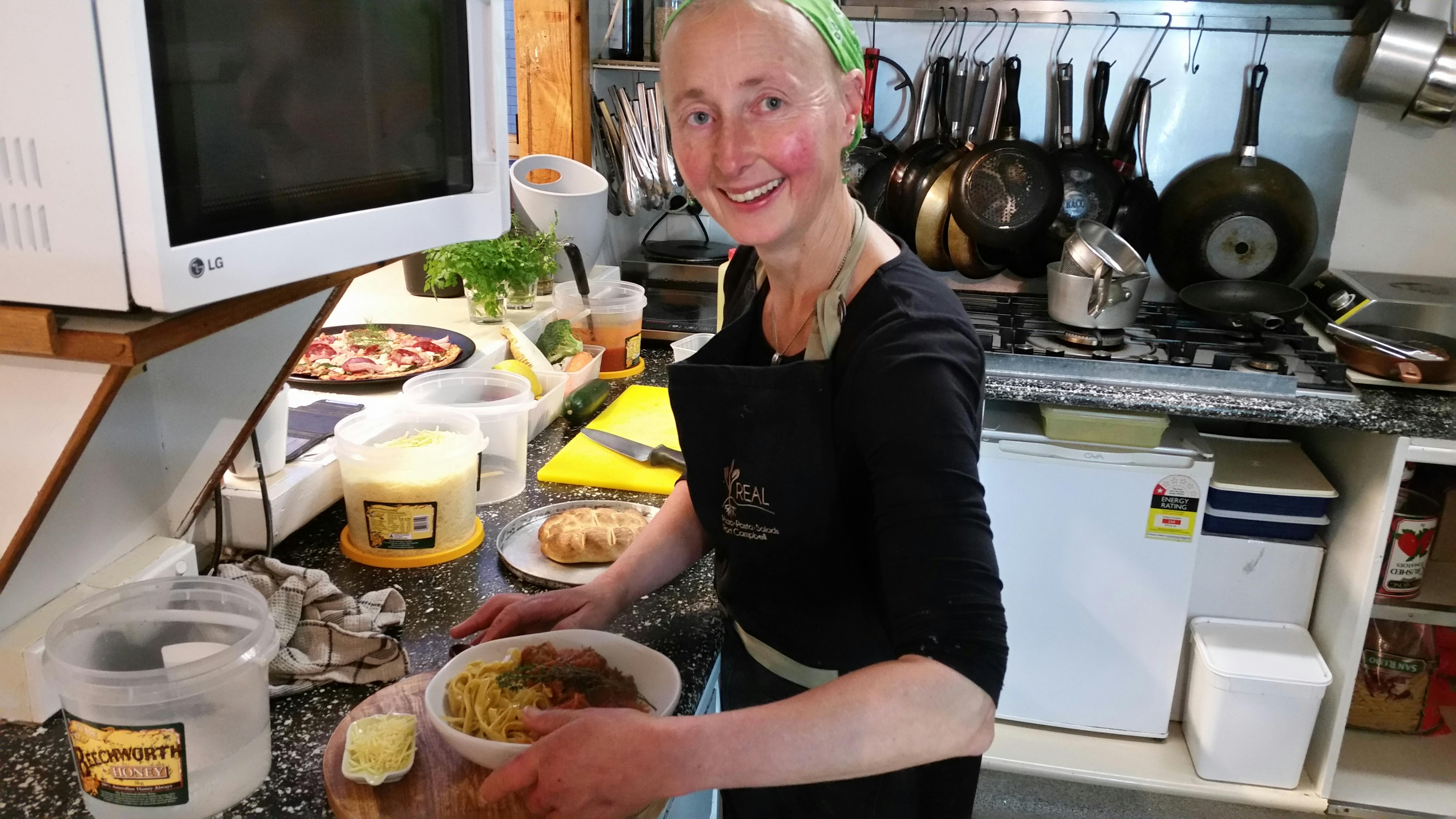 Kylie in the kitchen at REAL Pizza Pasta Salads