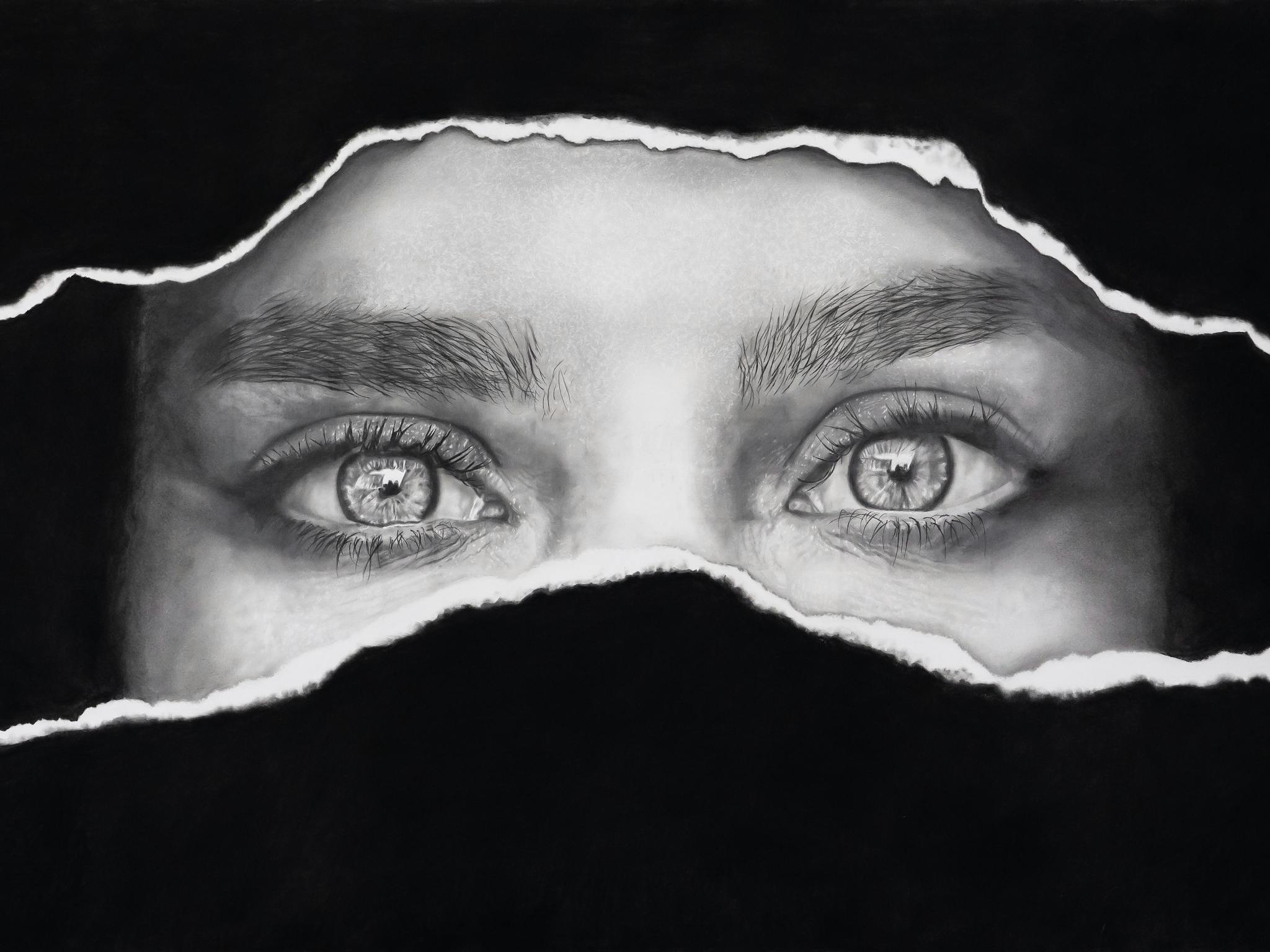 woman's eyes ripped paper