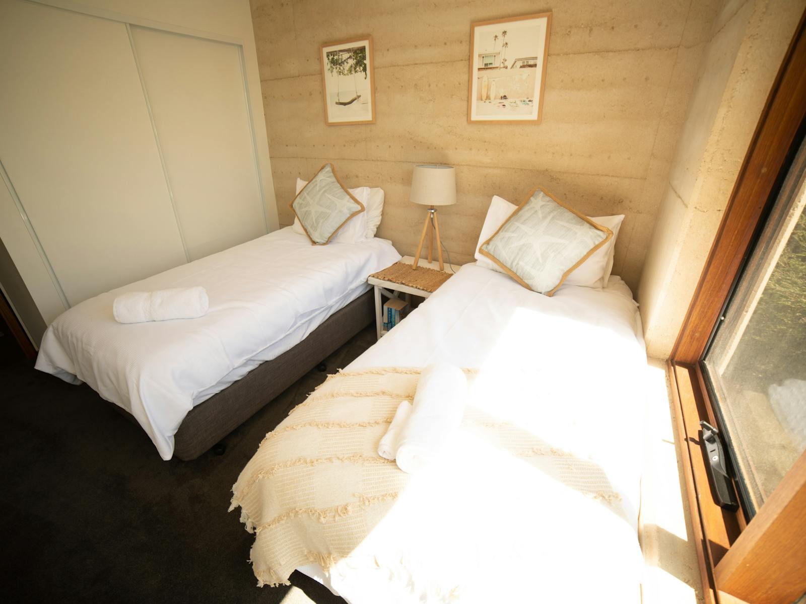 earth and ocean beach house downstairs bedroom