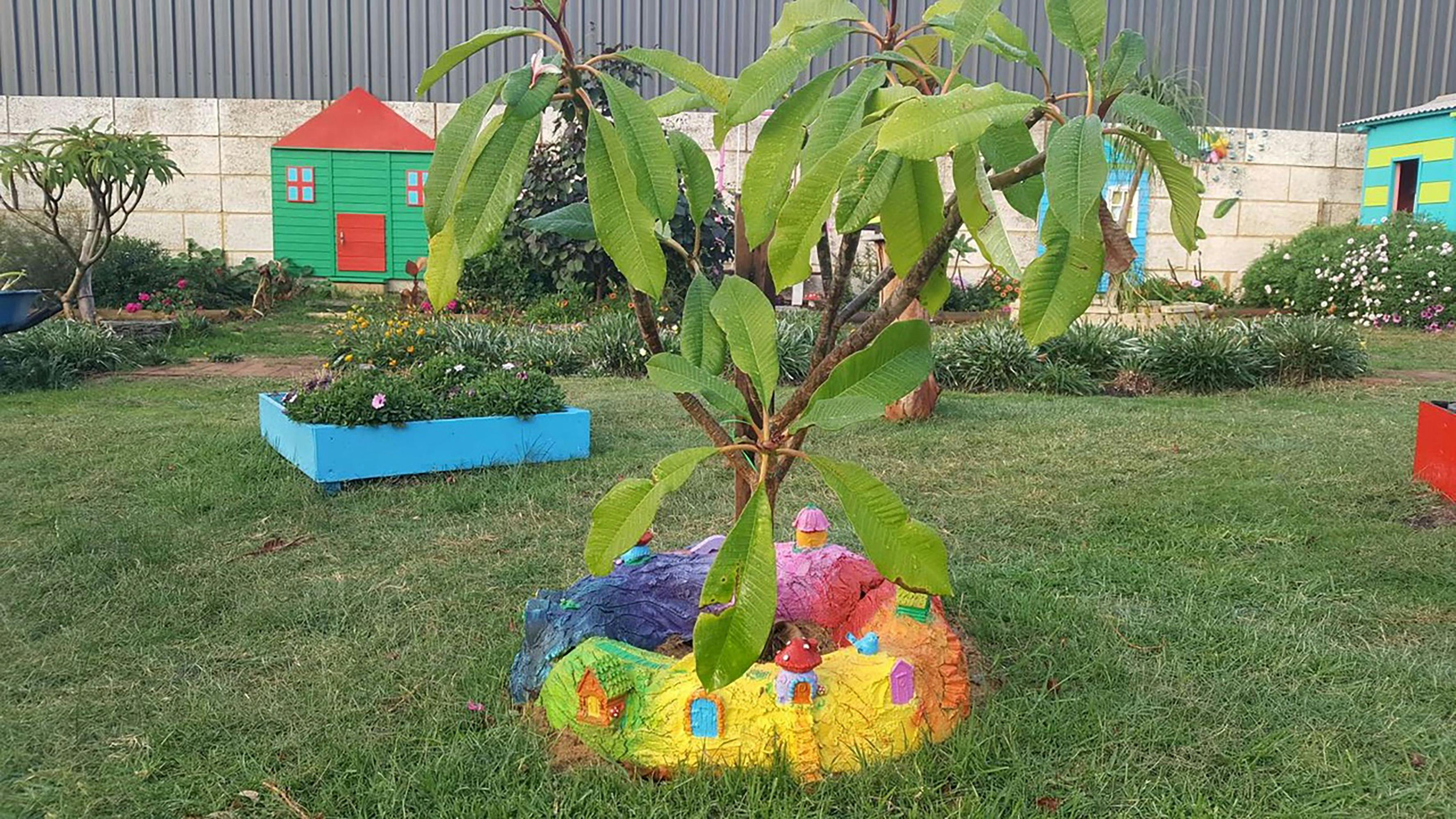 Even the surrounds of the trees and plants are fairy inspired at Magic Barn Fairy Garden.