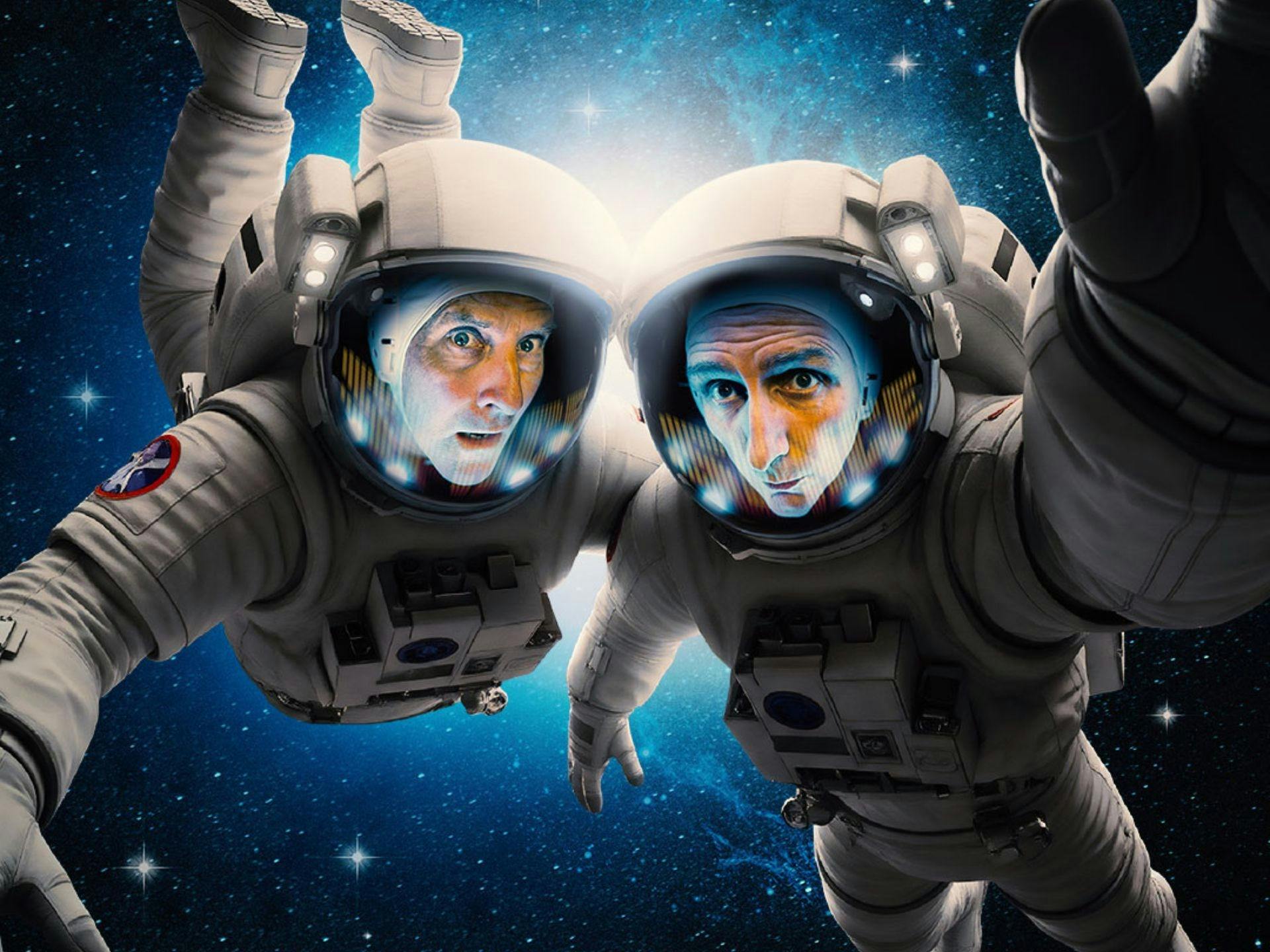 Colin Lano and Frank Woodley dressed as astronauts and floating in space looking worried
