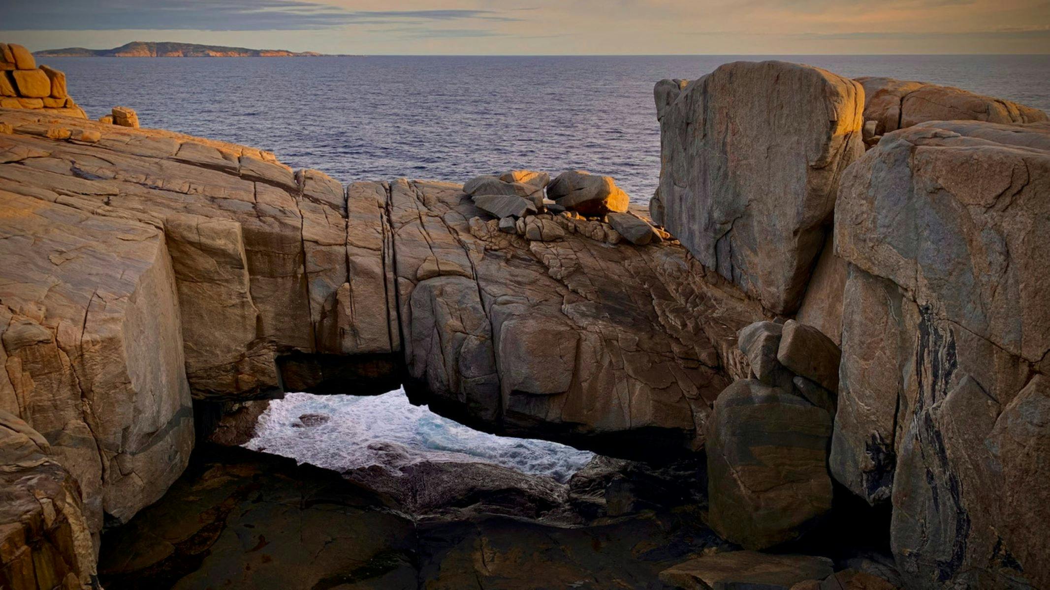 Rocky coastline with sea in the background