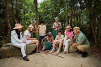 Guides share some bush tucker for guests to learn about