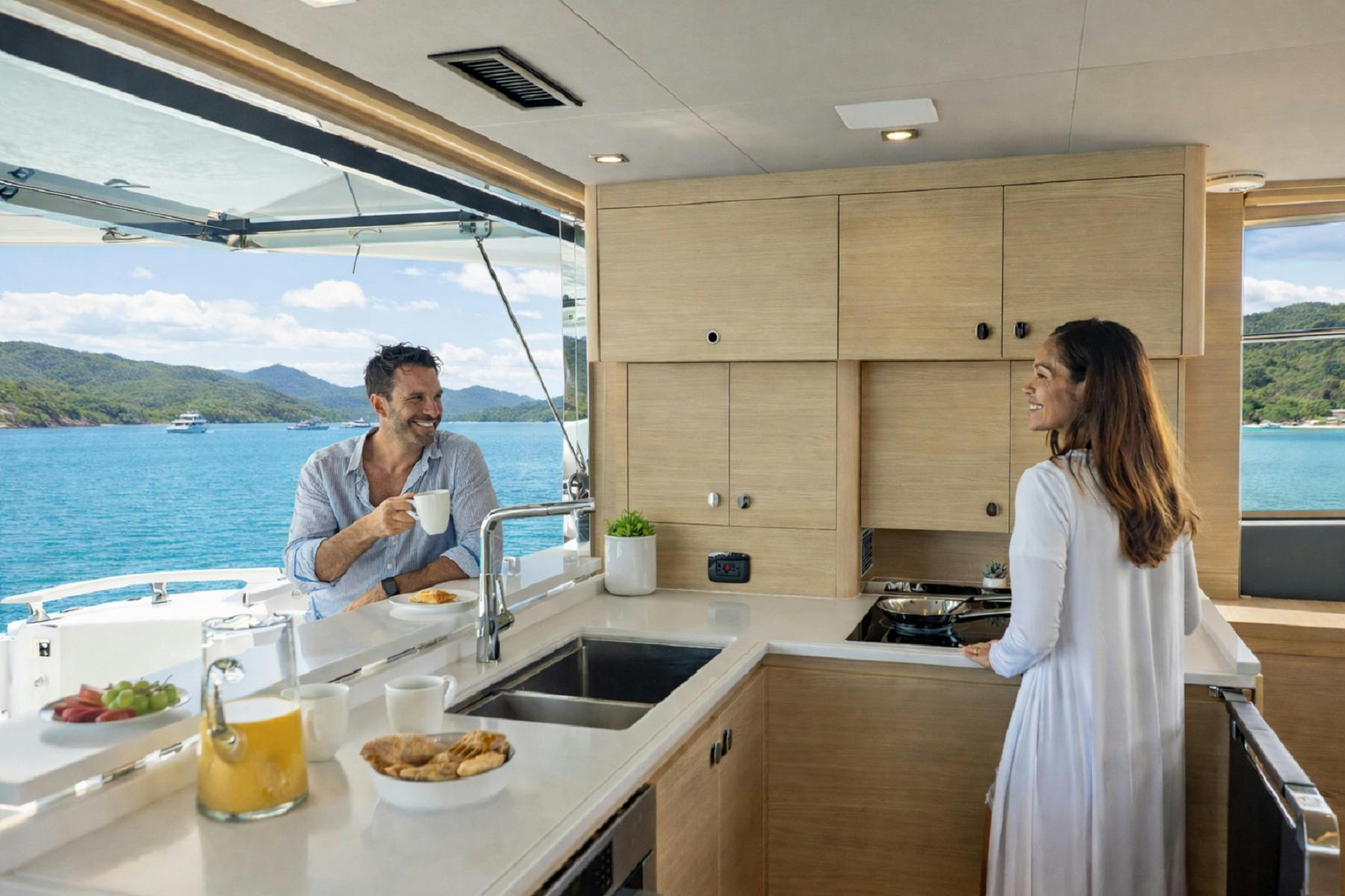 Man and woman on boat having breakfast