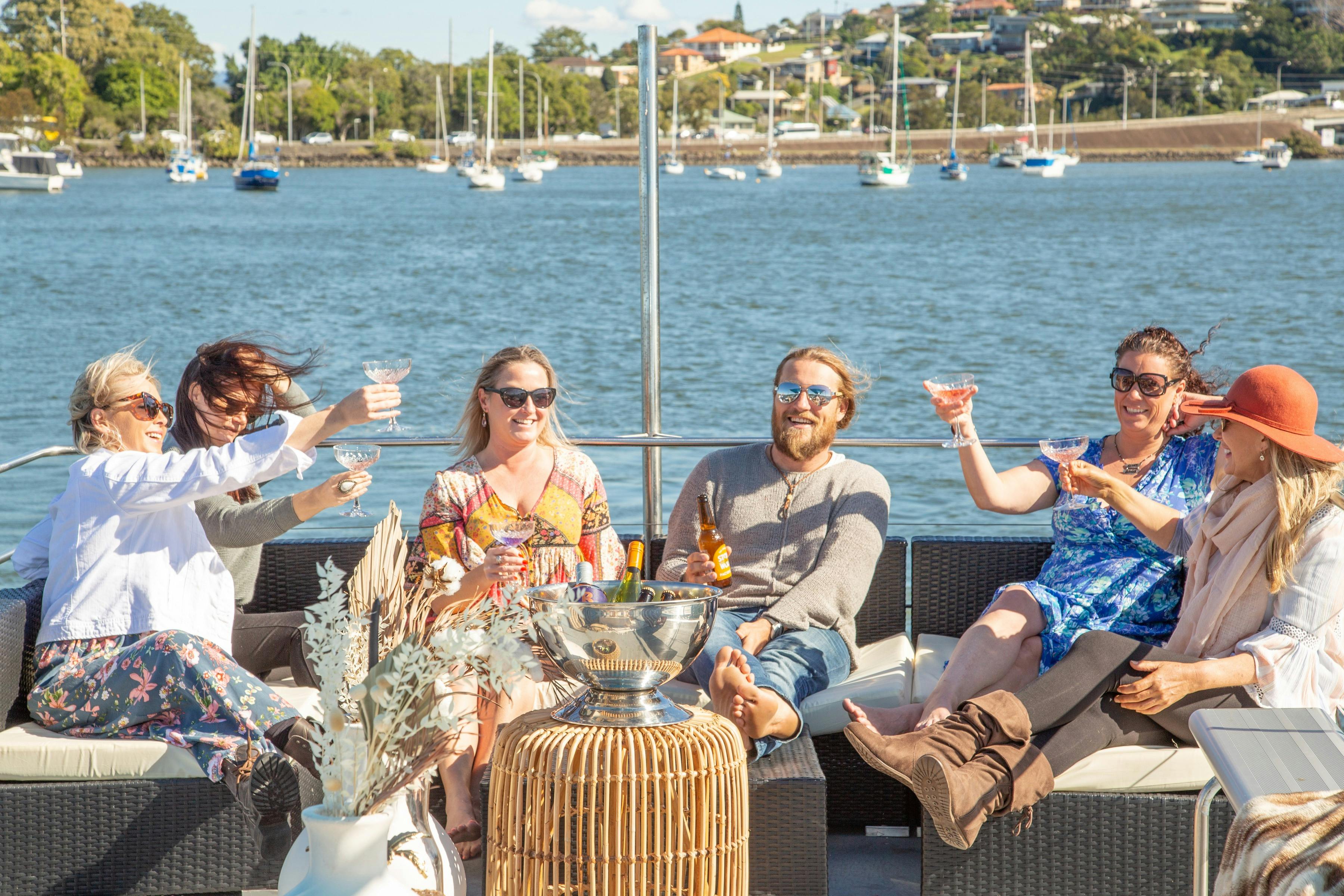 relaxing with a drink the most scenic cruise from the Gold Coast to Byron Bay, cruise into nature.