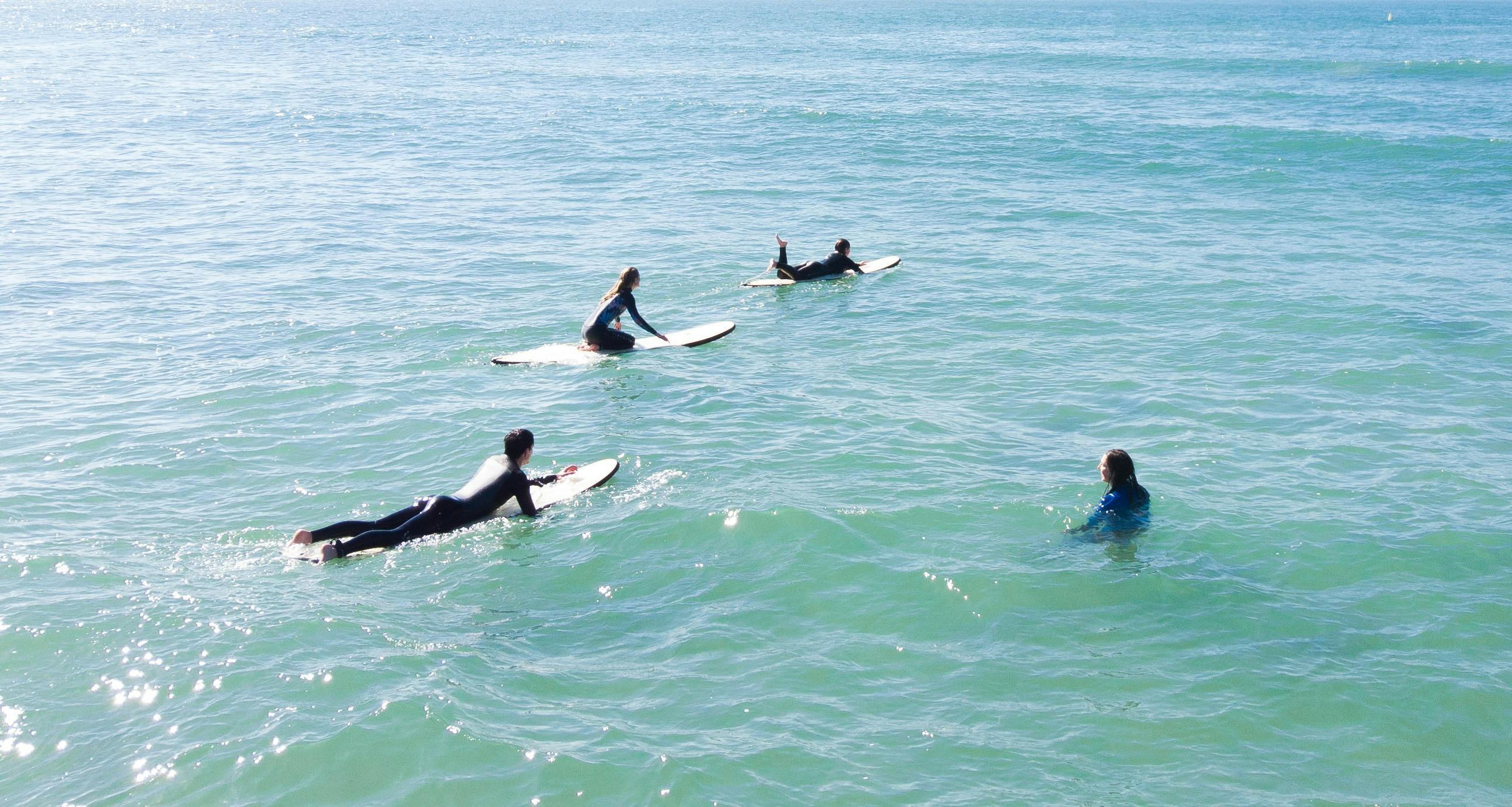 Surfers waiting for waves