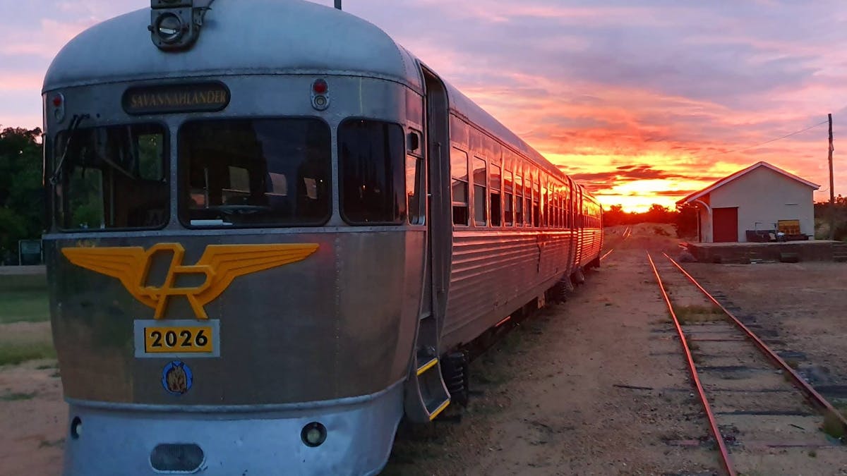 The Savannahlander railmotor unit 2026 parked at sunset in Forsayth
