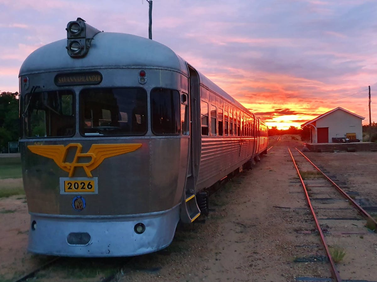 The Savannahlander railmotor unit 2026 parked at sunset in Forsayth