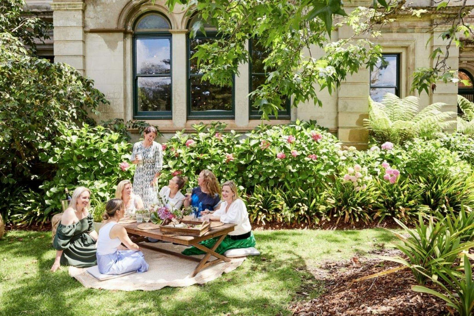 Private bohemian pop up picnic on the lawn