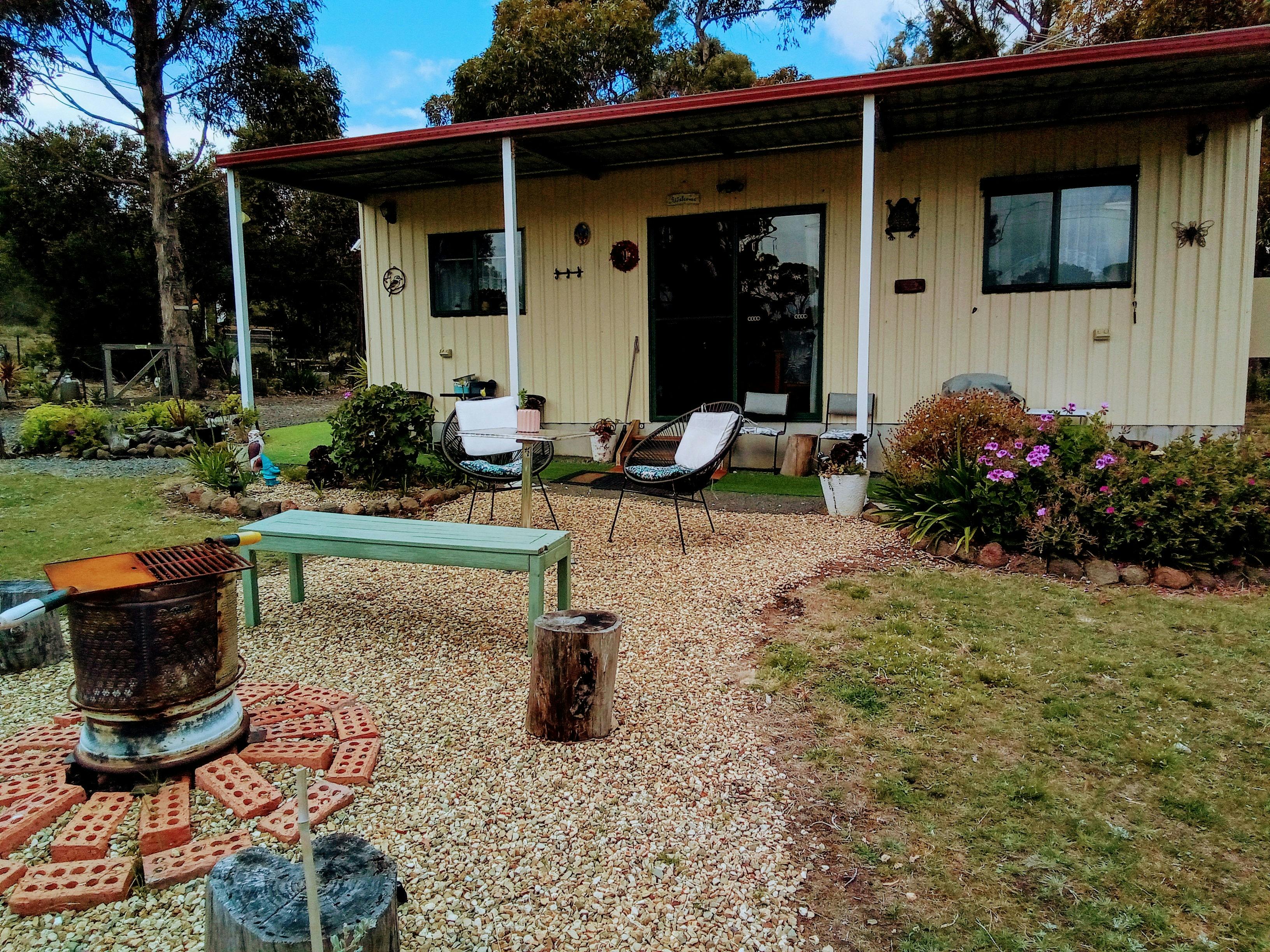 Outdoor area table and chairs and firepit