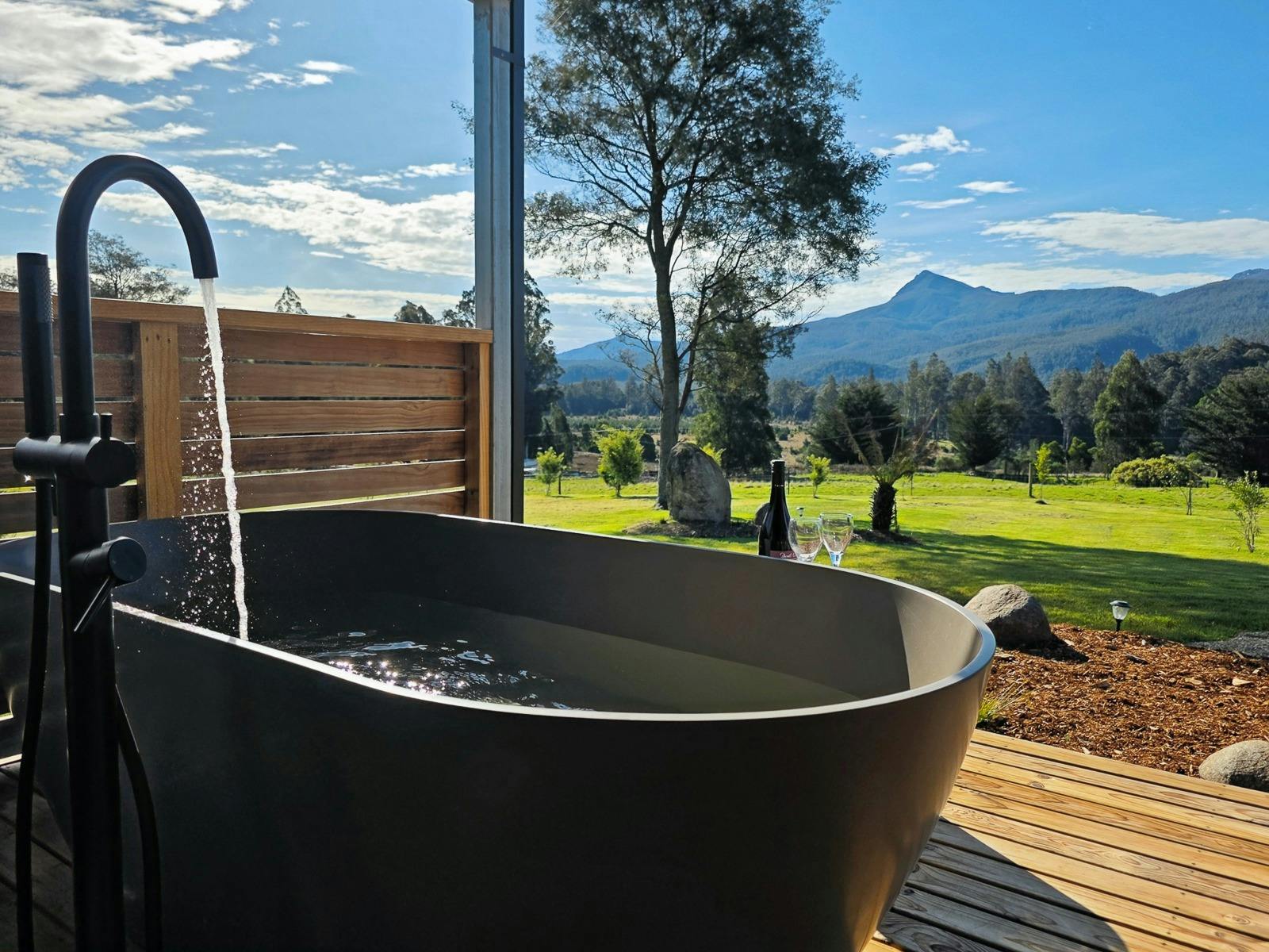 Nature meets nurture: Alpine cabin with outdoor bath image