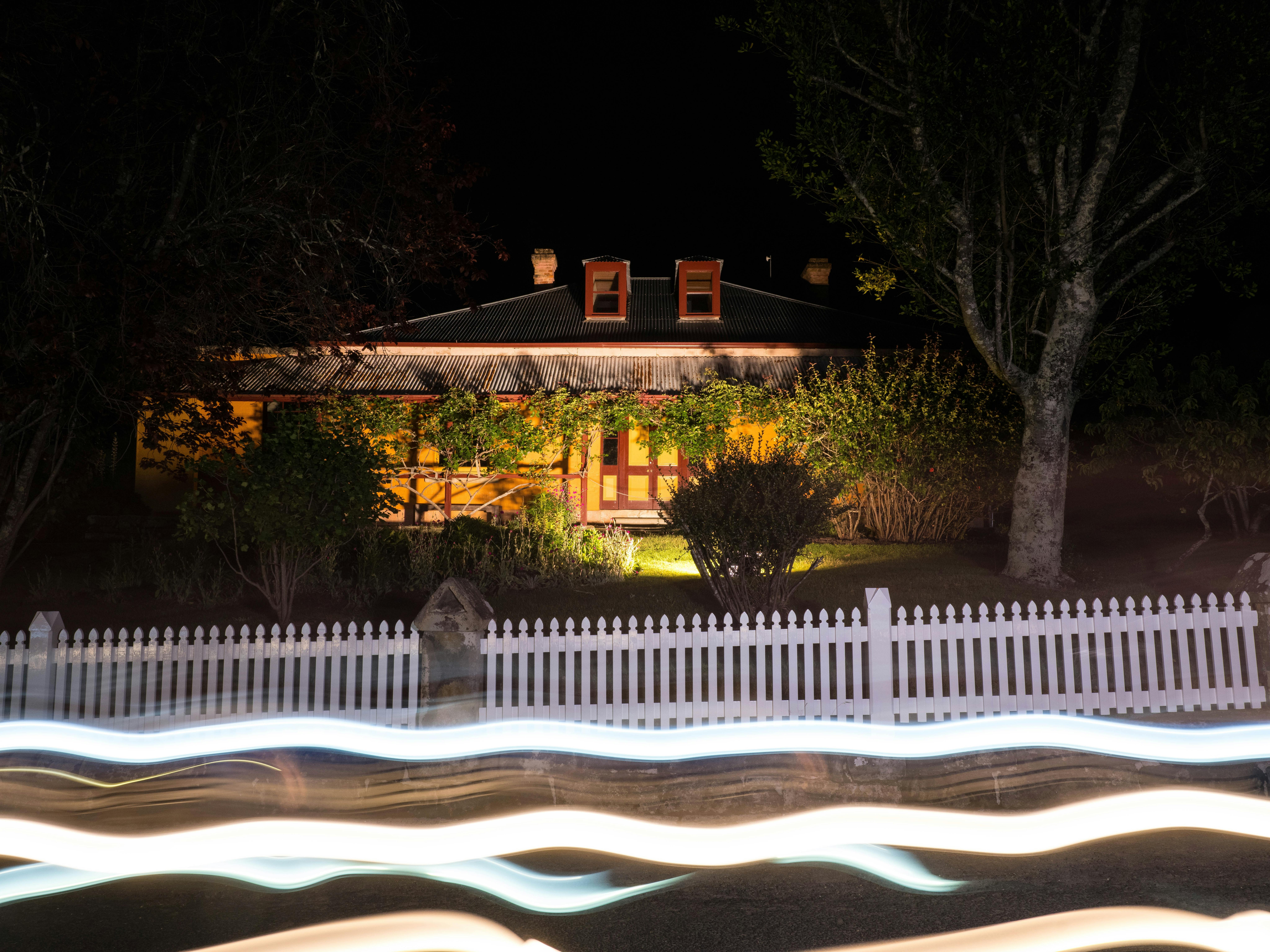 lanterns light the night in front of the Parsonage