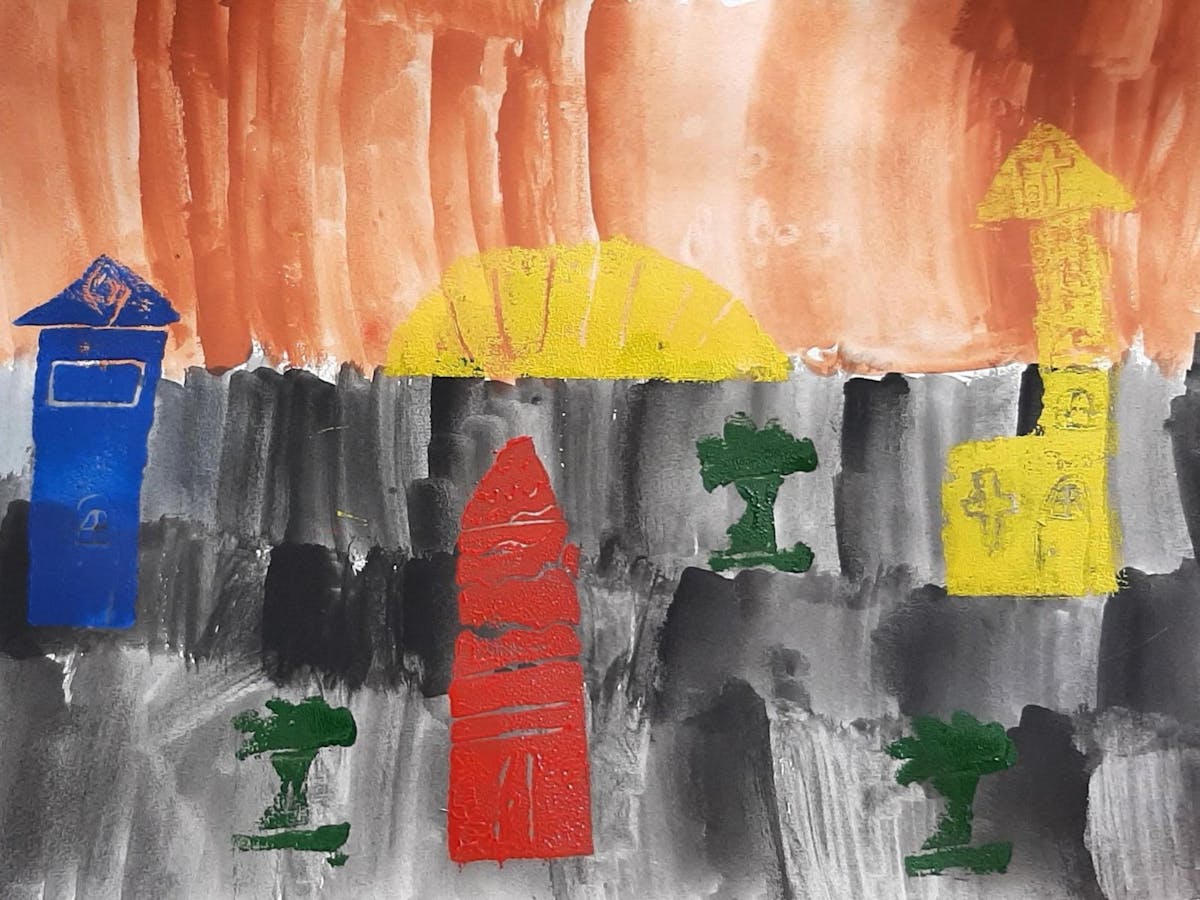 Printmaking artwork made by a child featuring primary colours