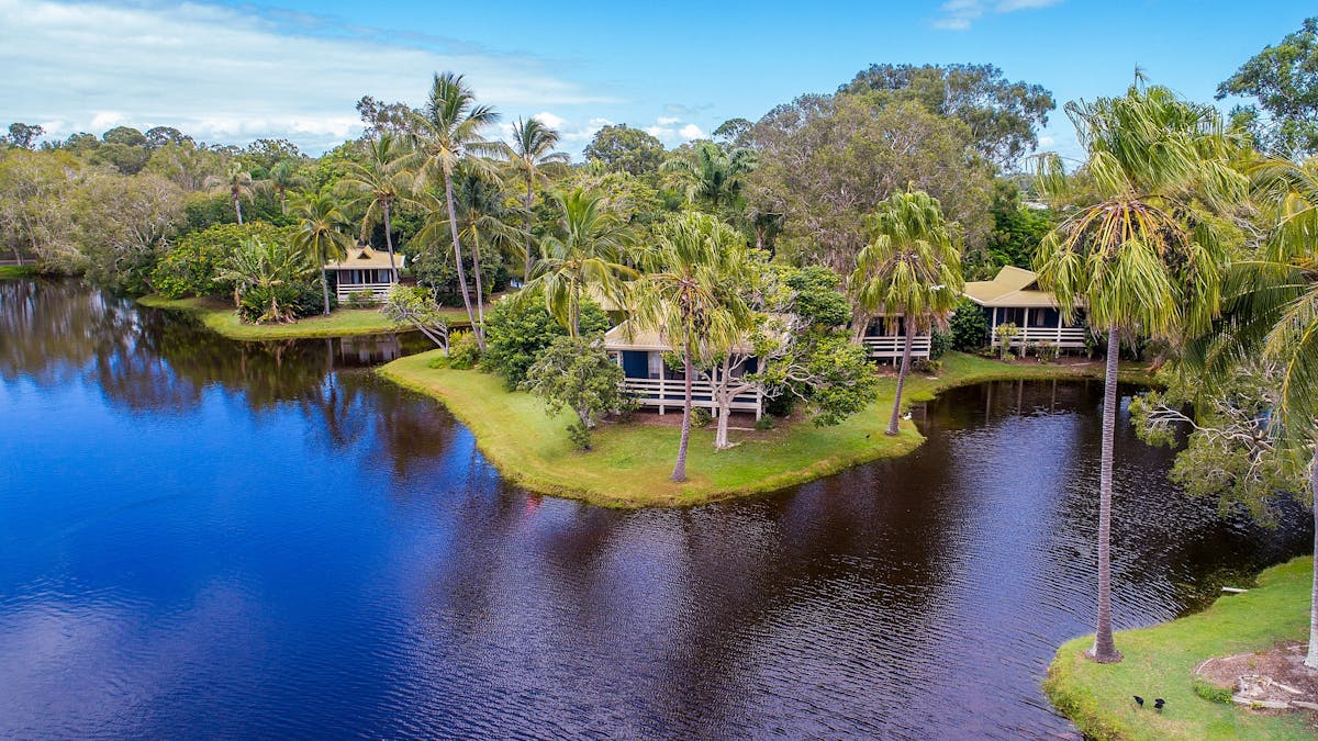 A quiet relaxing holiday with a lakeside view from every villa