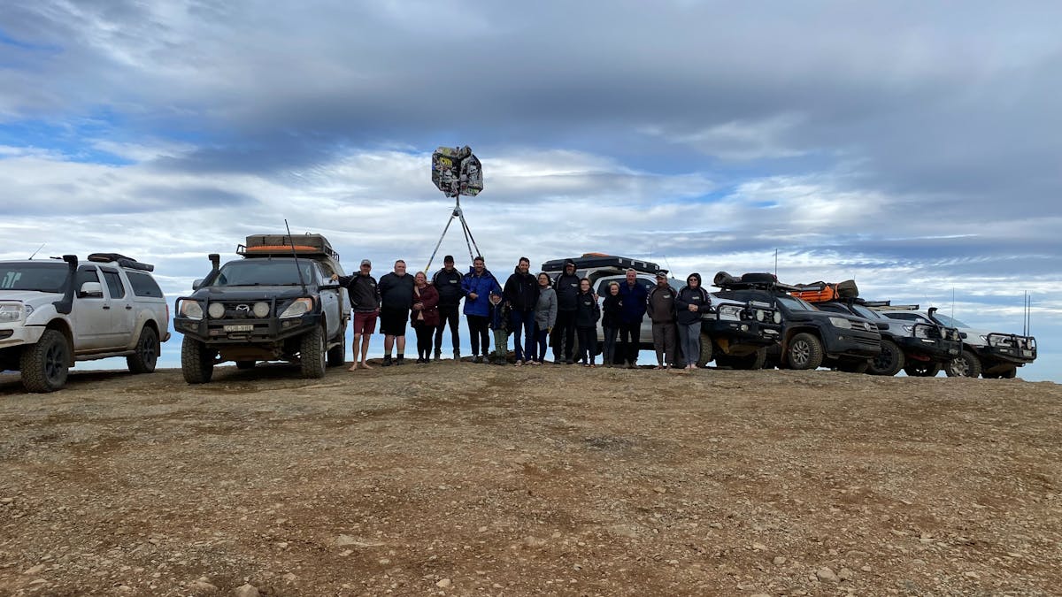 Tour group at Blue Rag Trig Point in the Vic High Country